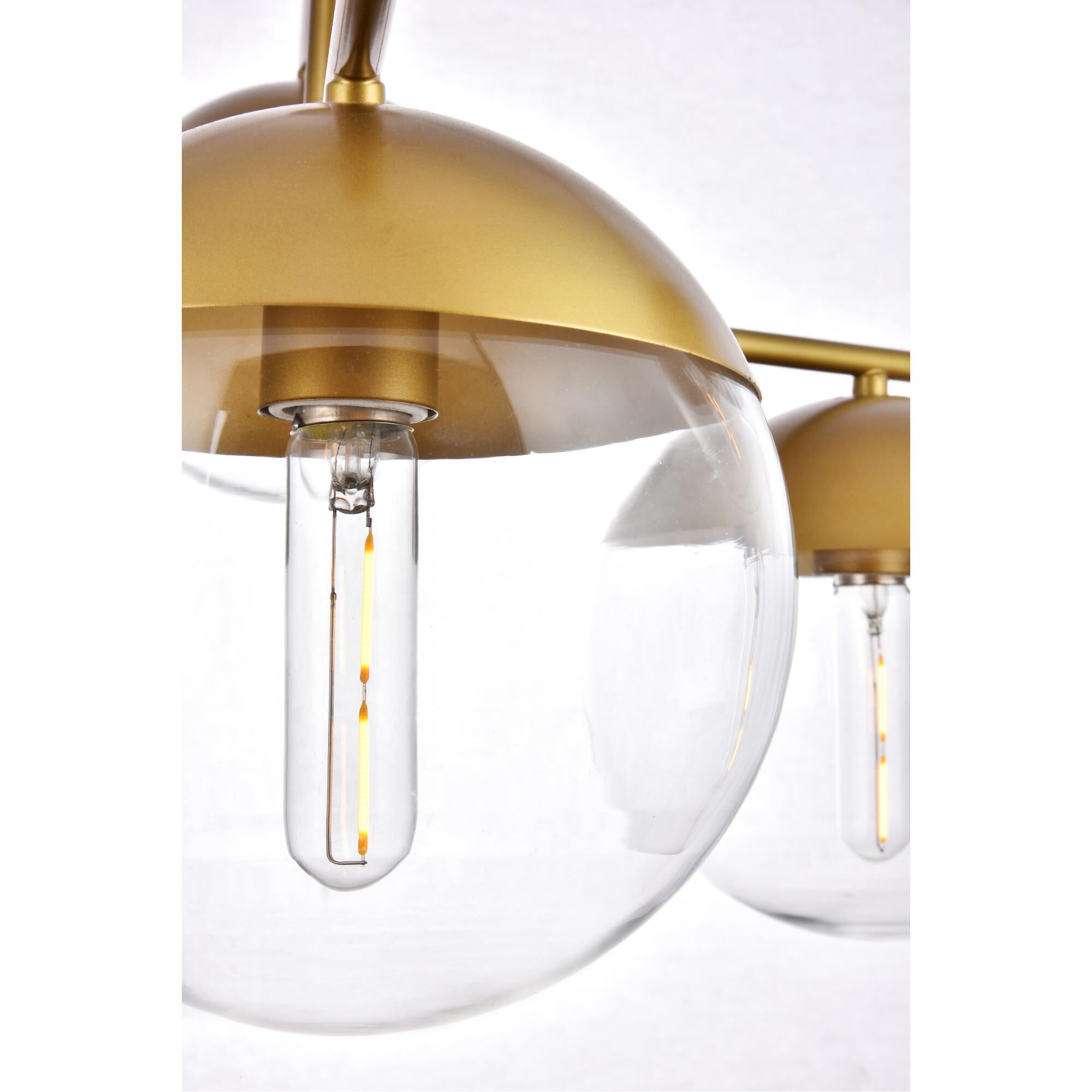 Shown in Brass finish and Clear glass