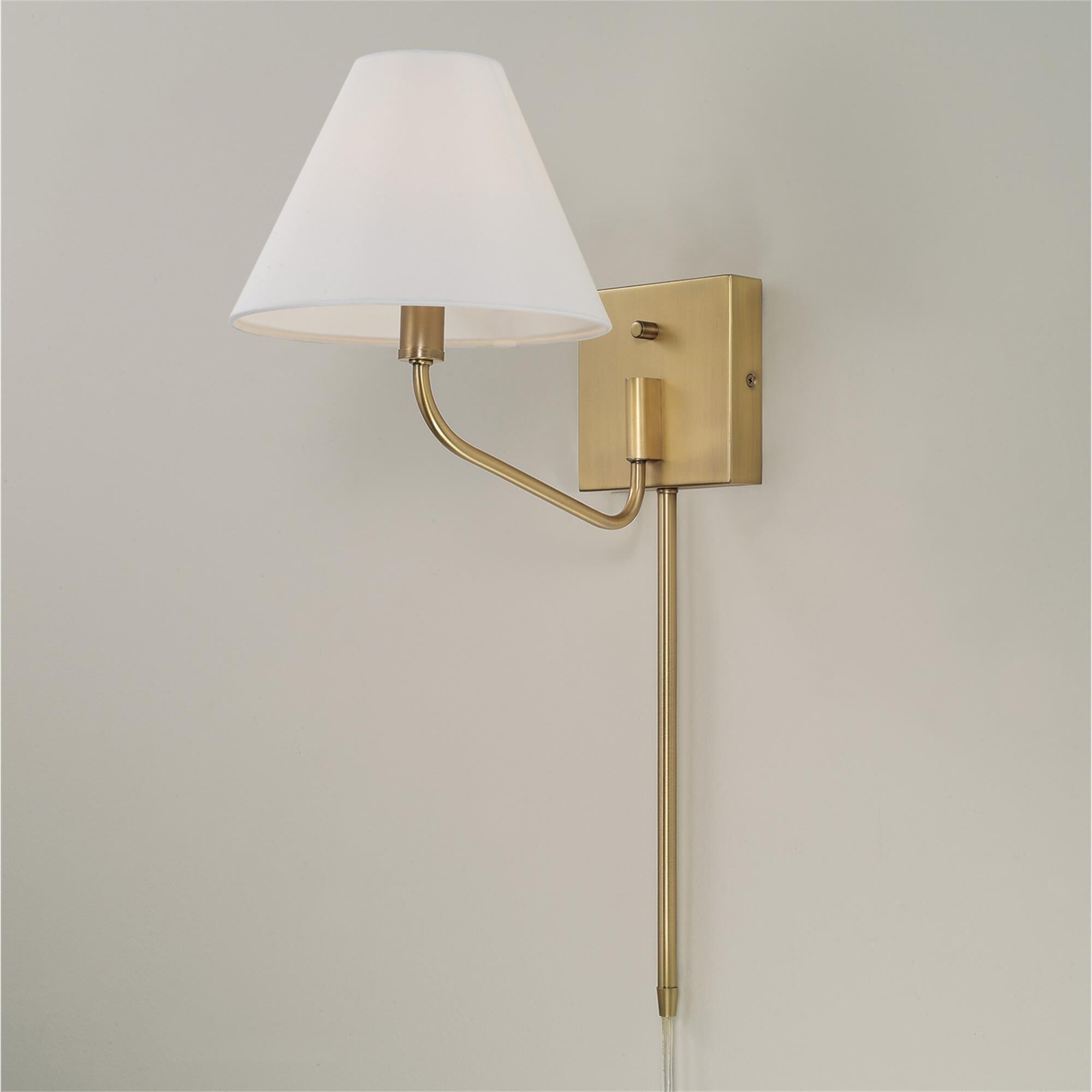 Shown in Aged Brass finish and White Fabric shade