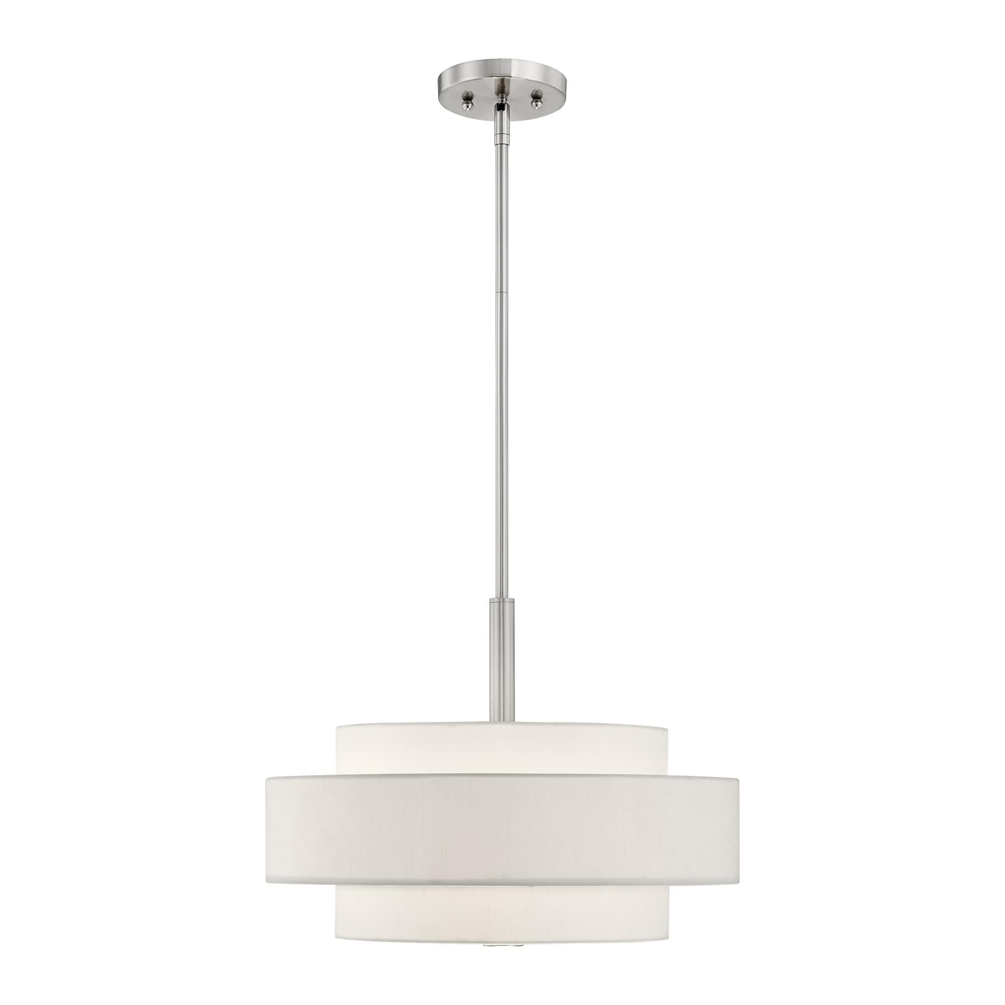 Shown in Brushed Nickel finish and Hand Crafted Off-White Fabric Hardback shade