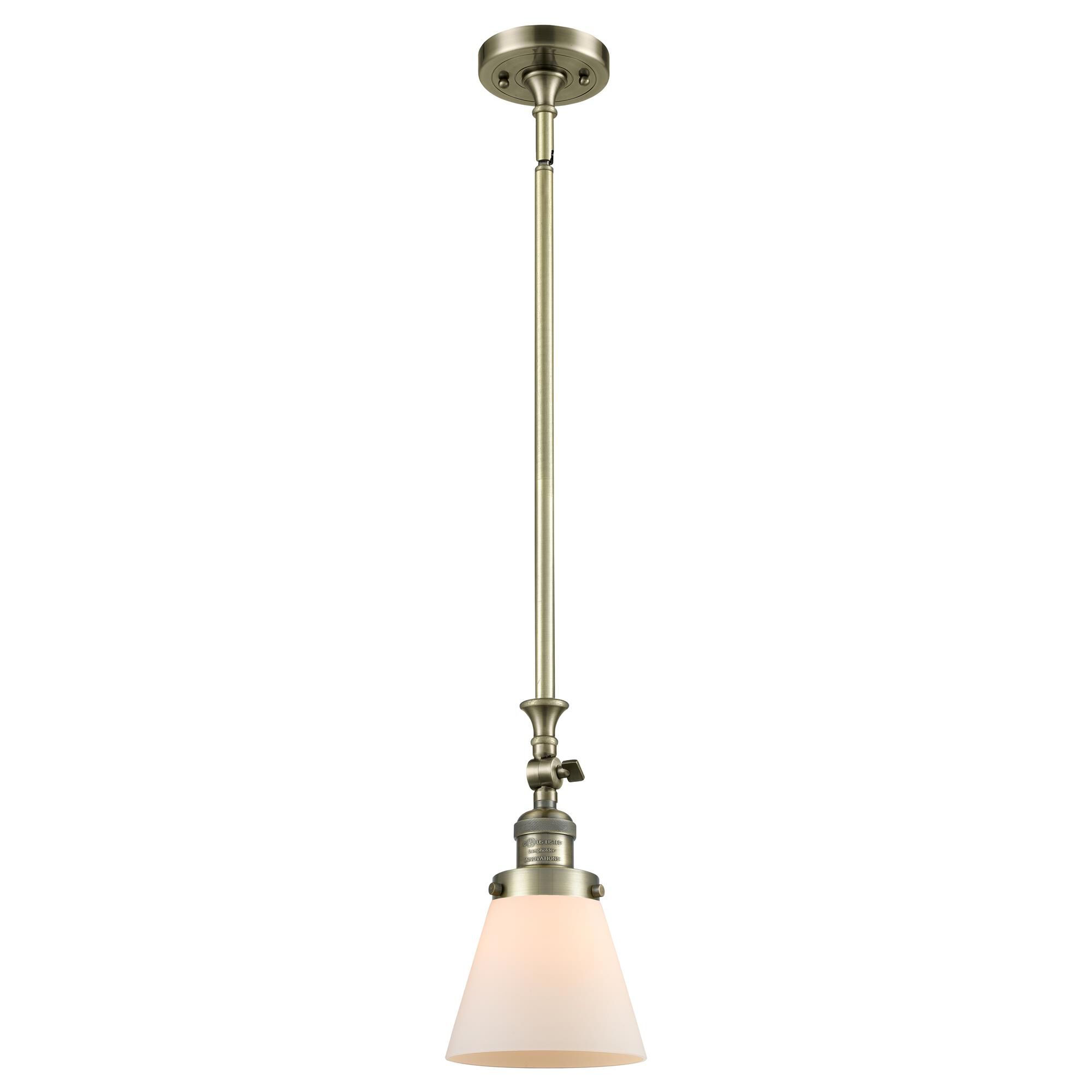 Shown in Antique Brass finish and Matte White Cased glass