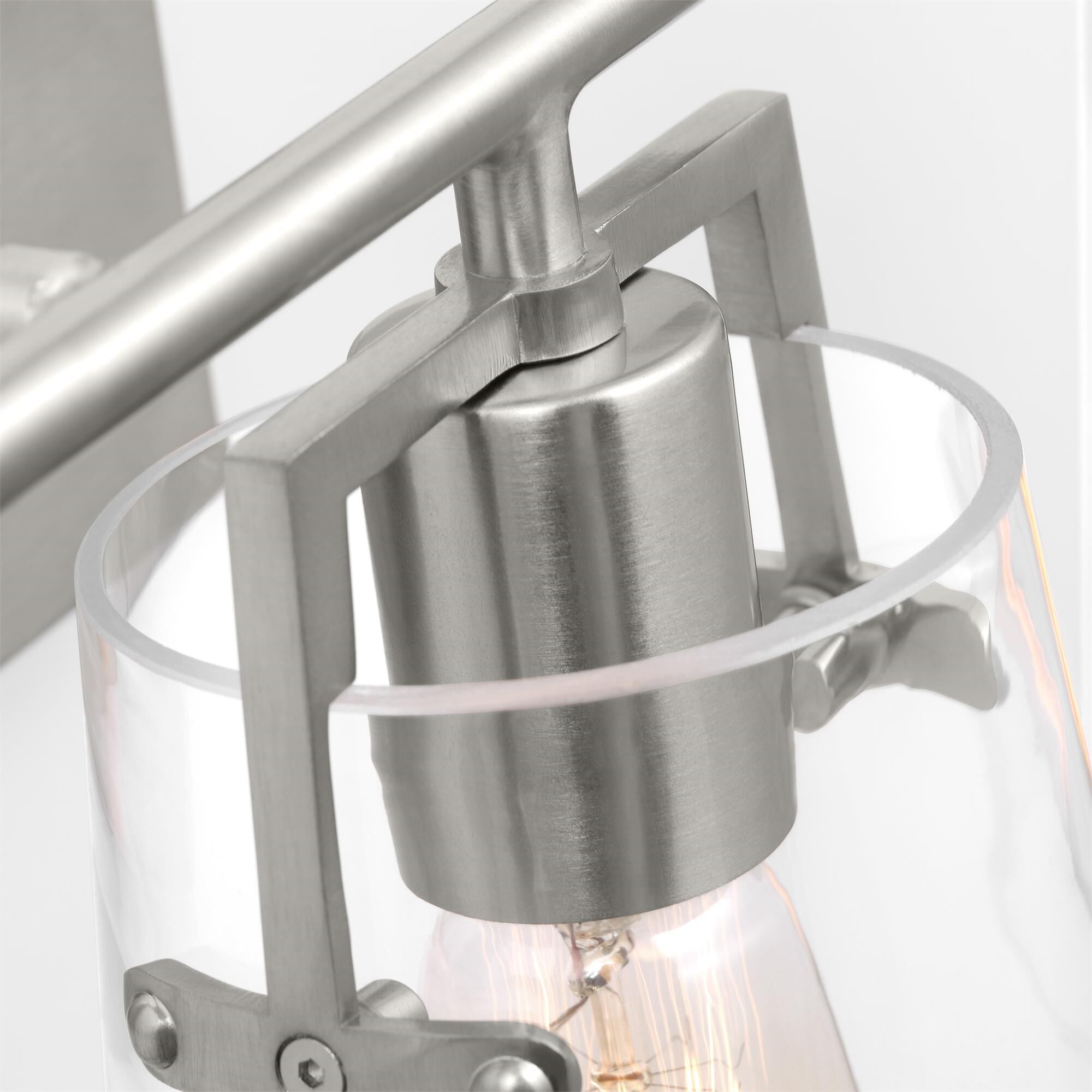 Shown in Brushed Steel finish and Clear Glass s shade