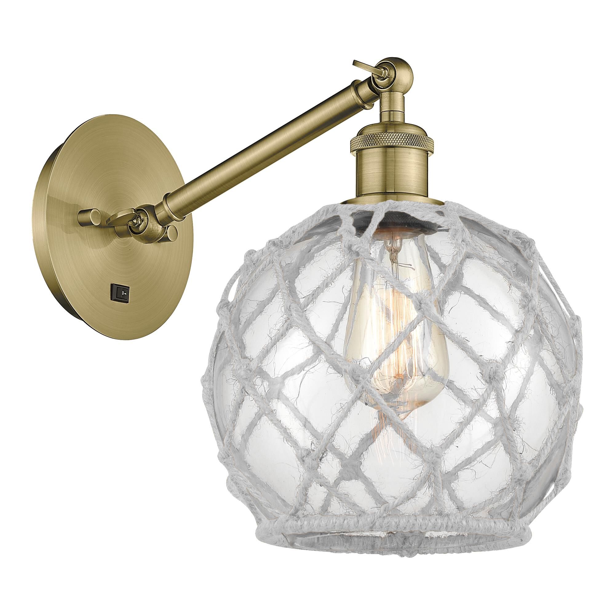 Shown in Antique Brass finish and Clear with White Rope glass