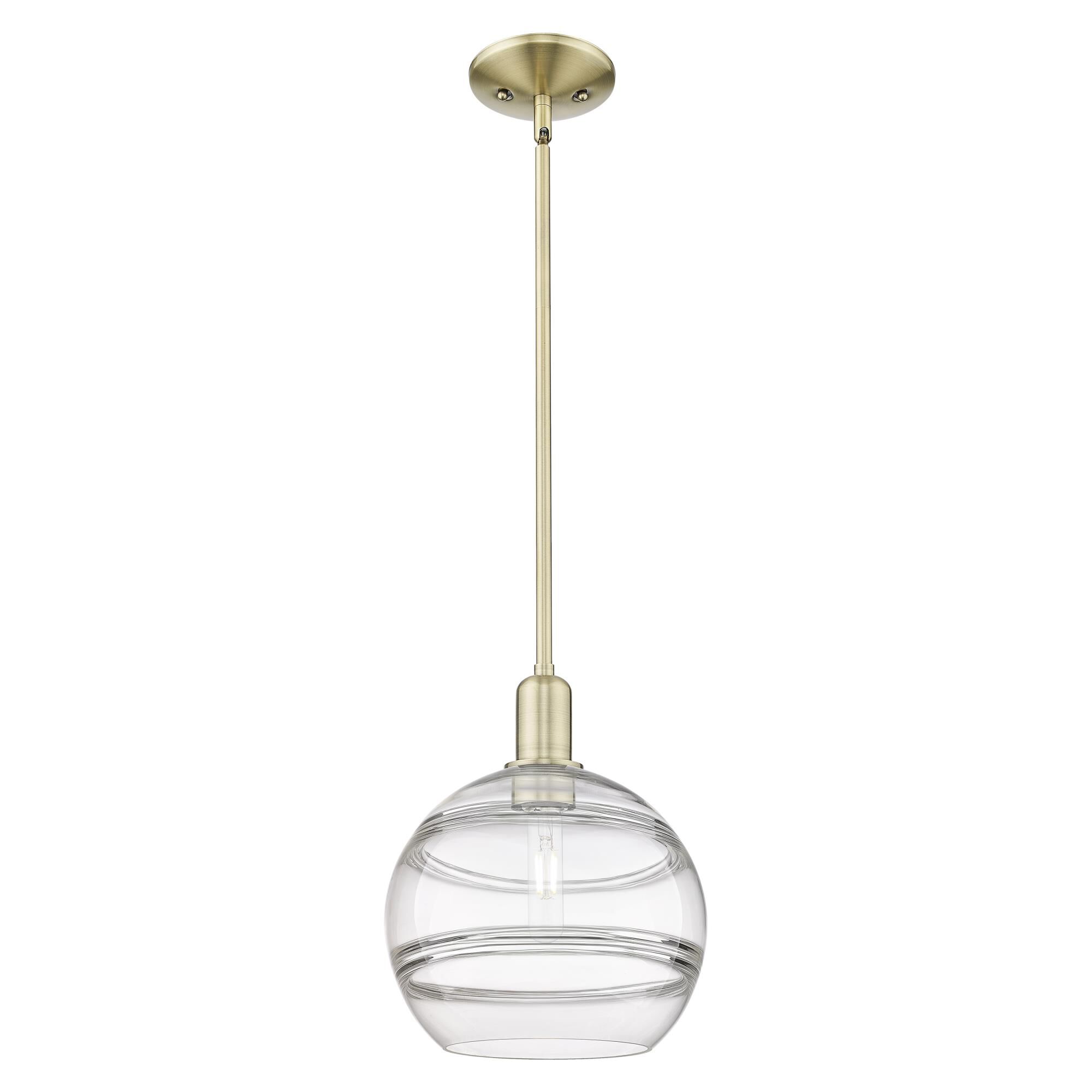 Shown in Antique Brass finish and Clear glass