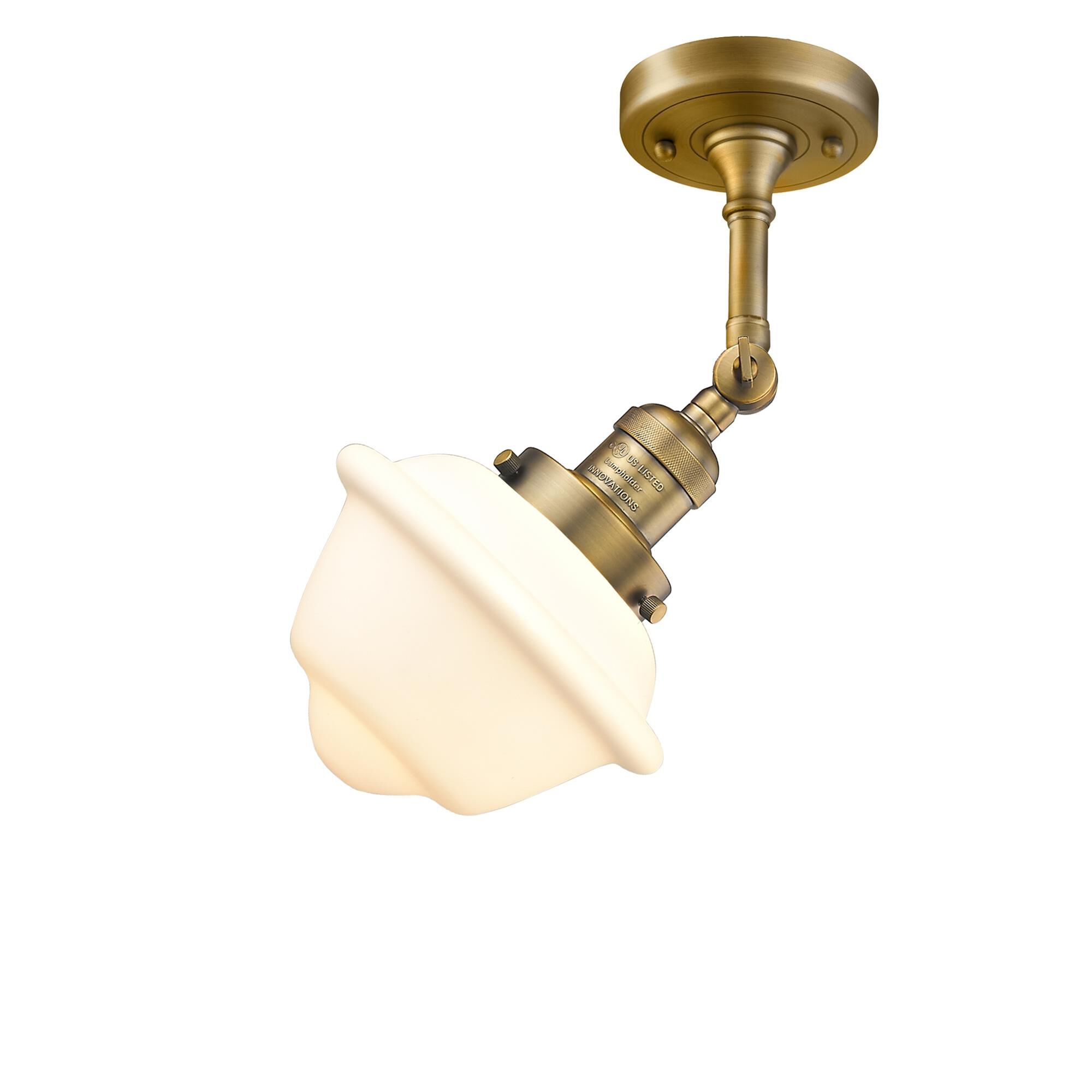 Shown in Brushed Brass finish and Matte White Cased glass