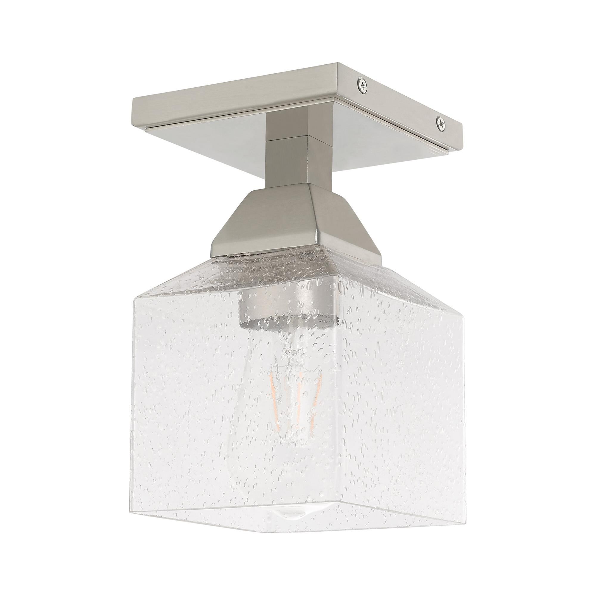 Shown in Brushed Nickel finish and Hand Blown Clear Seeded glass