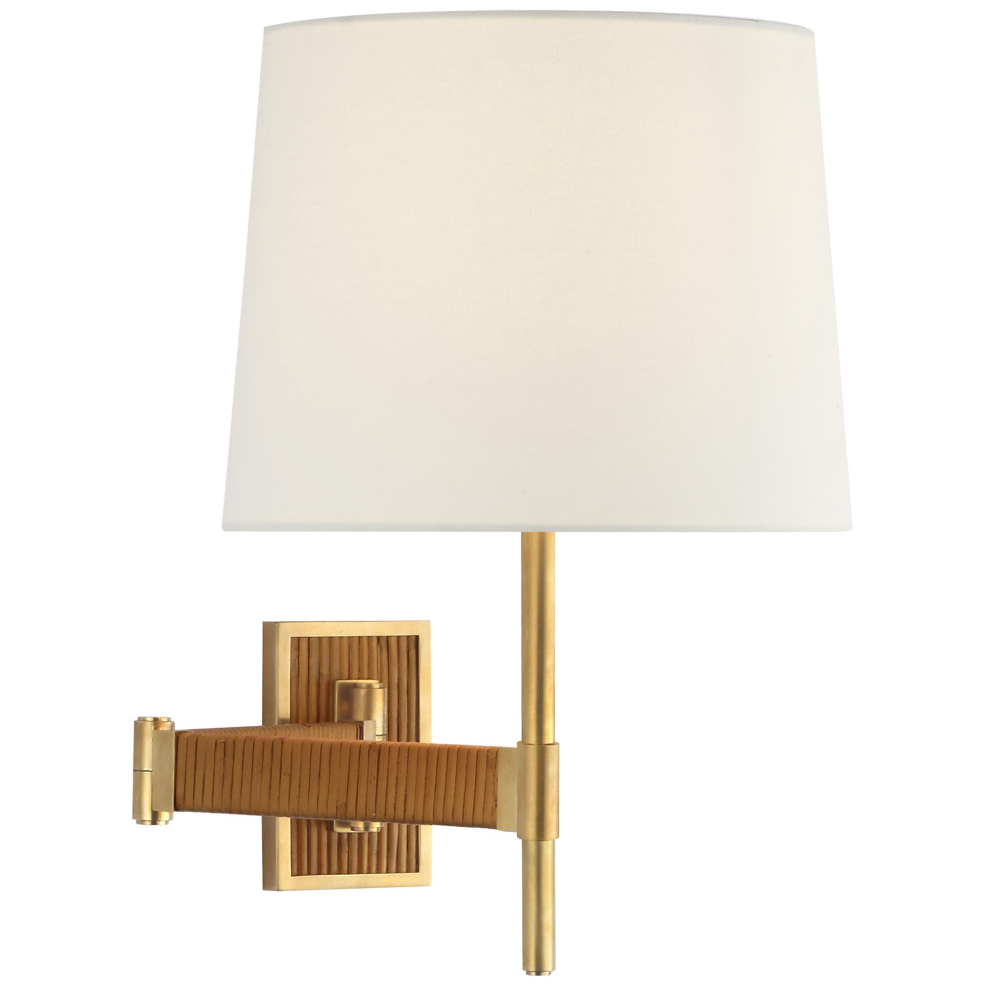 Shown in Hand-Rubbed Antique Brass and Dark Rattan finish and Linen shade
