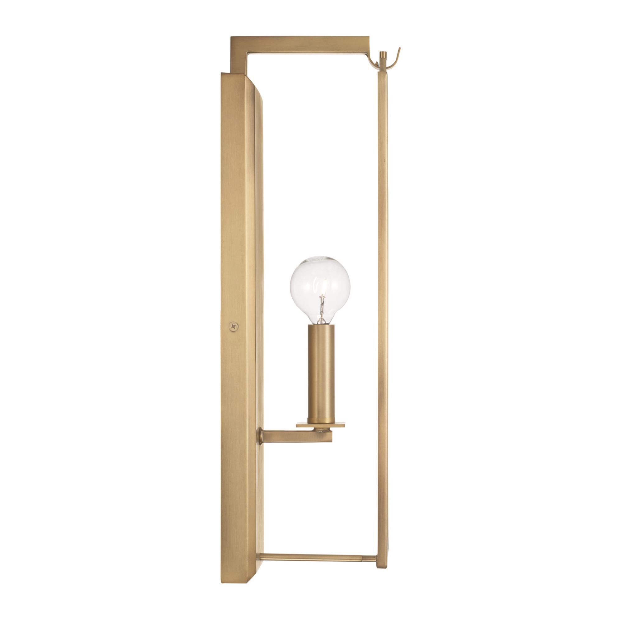 Shown in Aged Brass finish and Antiqued Rain glass