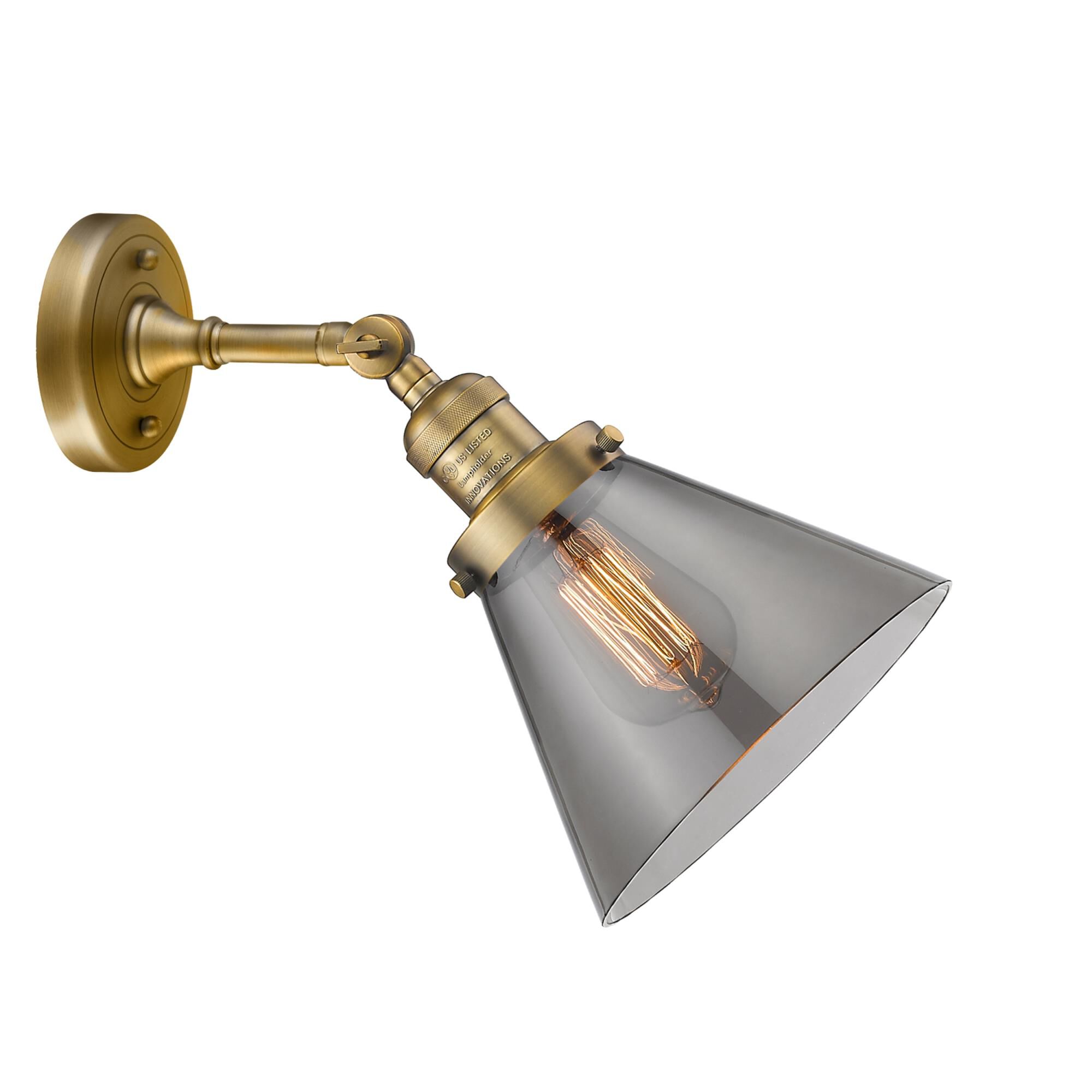 Shown in Brushed Brass finish and Smoked glass and None accent