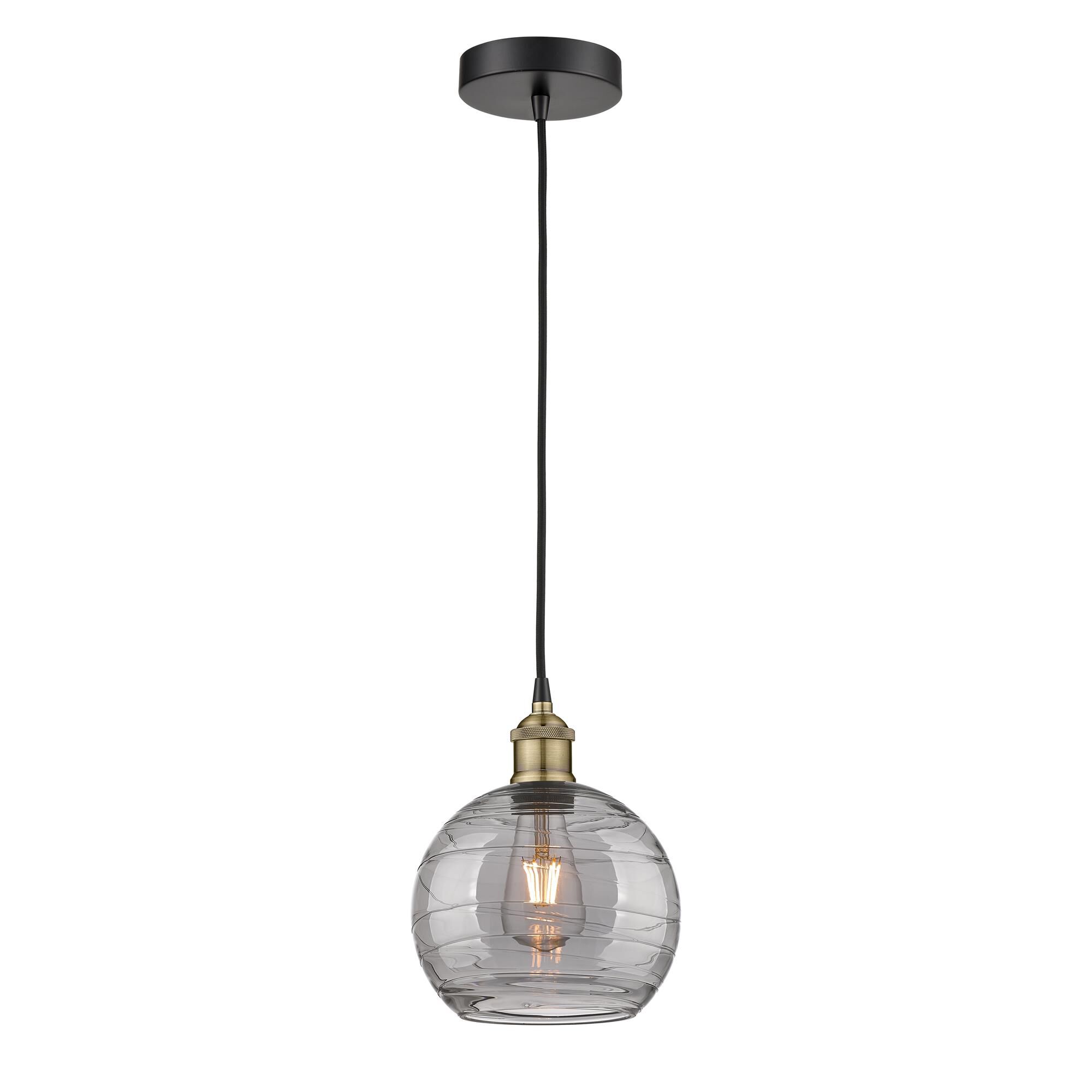 Shown in Black Antique Brass finish and Light Smoke Deco Swirl glass