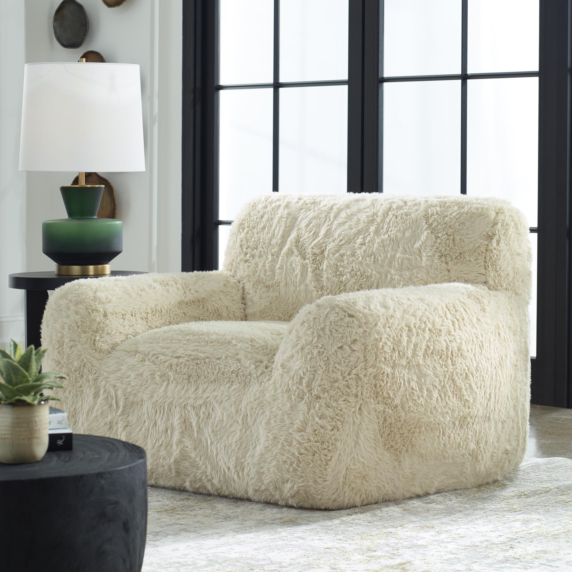 Shown in The Definition Of A Cozy Place To Rest, The Caramel Toned Long-Haired Faux Sheepskin Creates Rich Te finish
