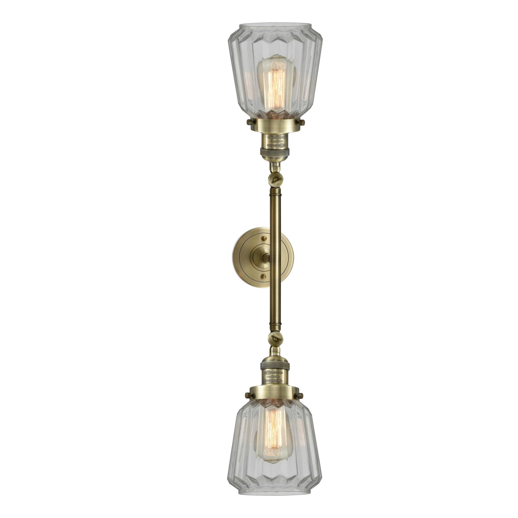 Shown in Antique Brass finish and Clear glass