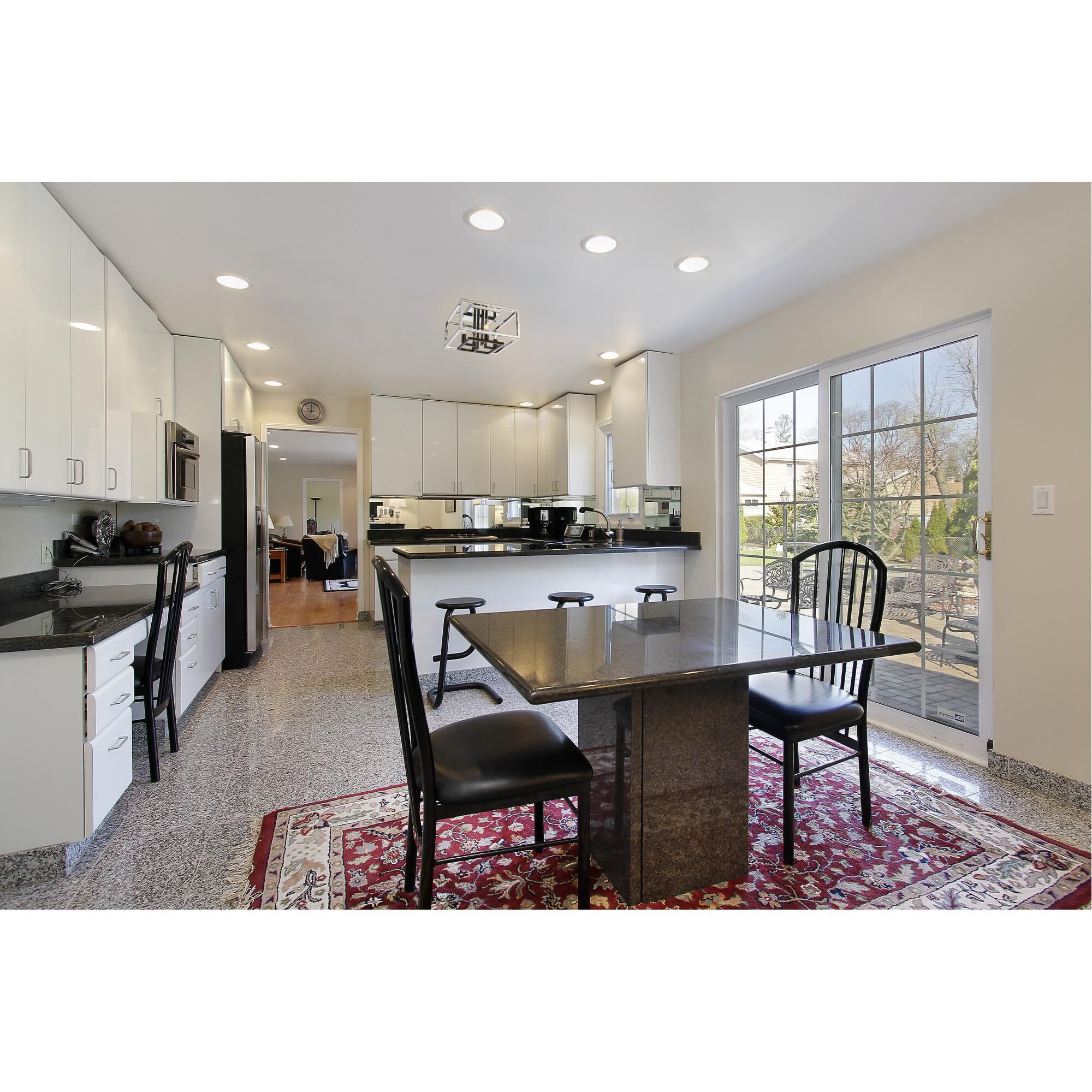 Shown in Chrome + Black finish and --- glass and --- shade