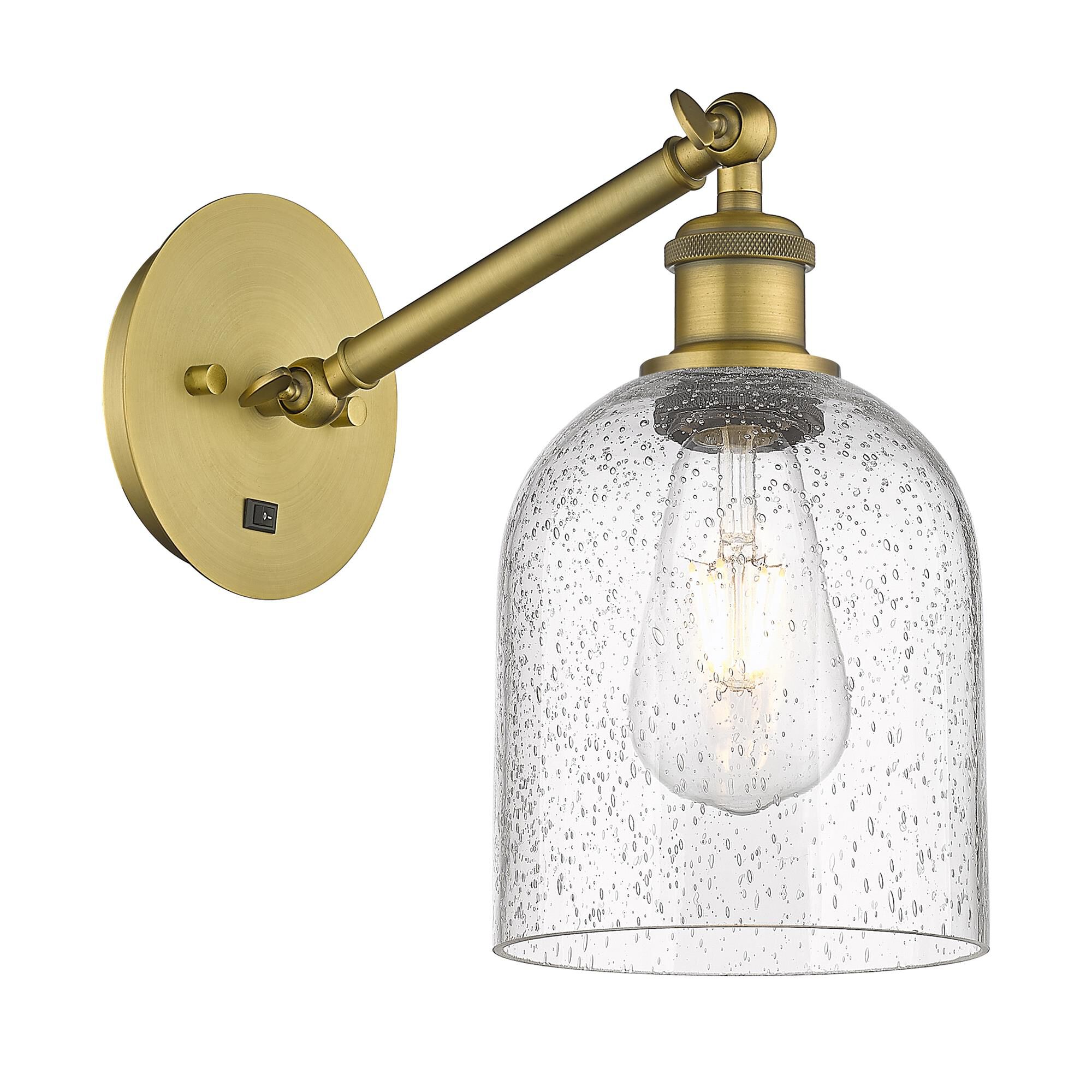 Shown in Brushed Brass finish and Seedy glass