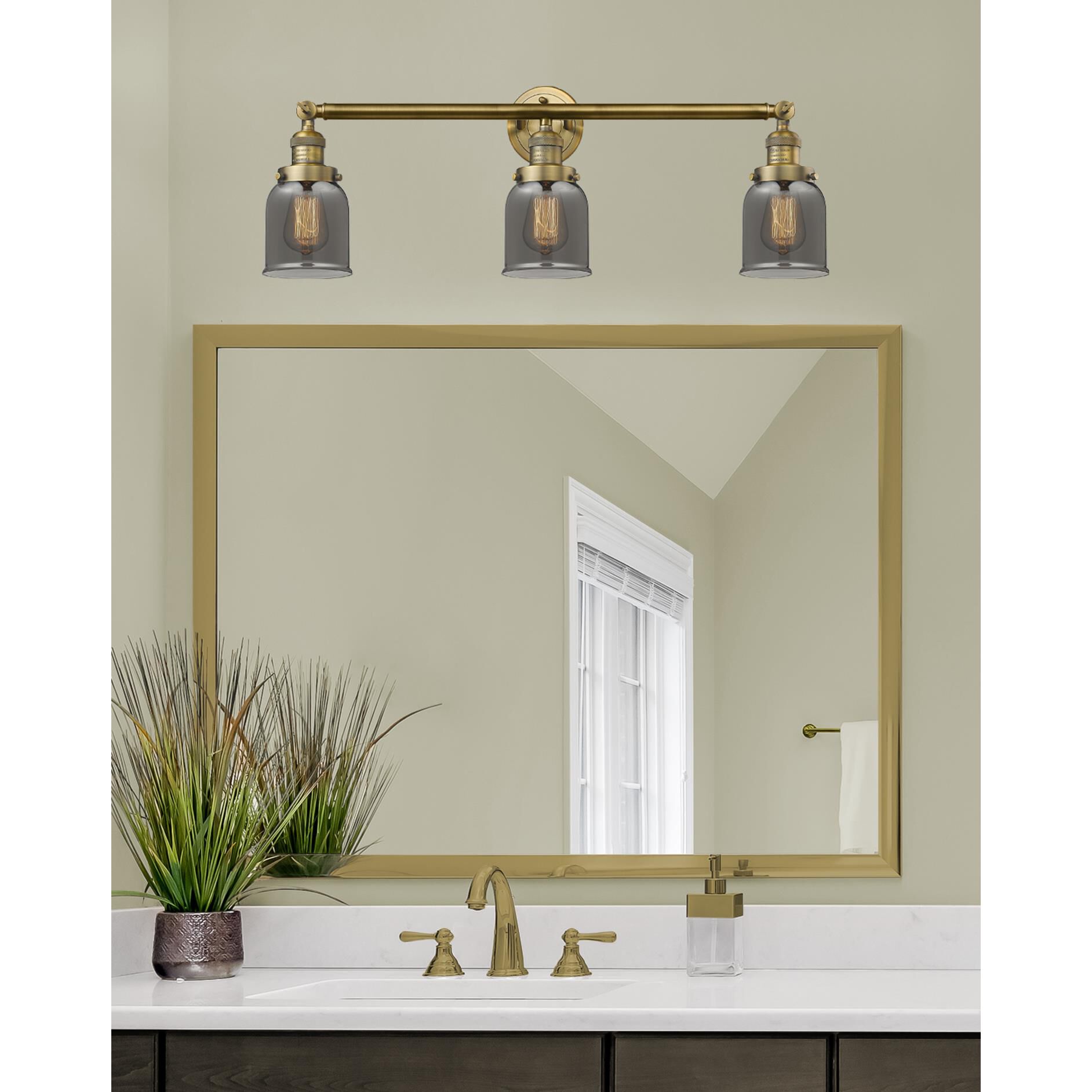 Shown in Brushed Brass finish and Plated Smoked glass