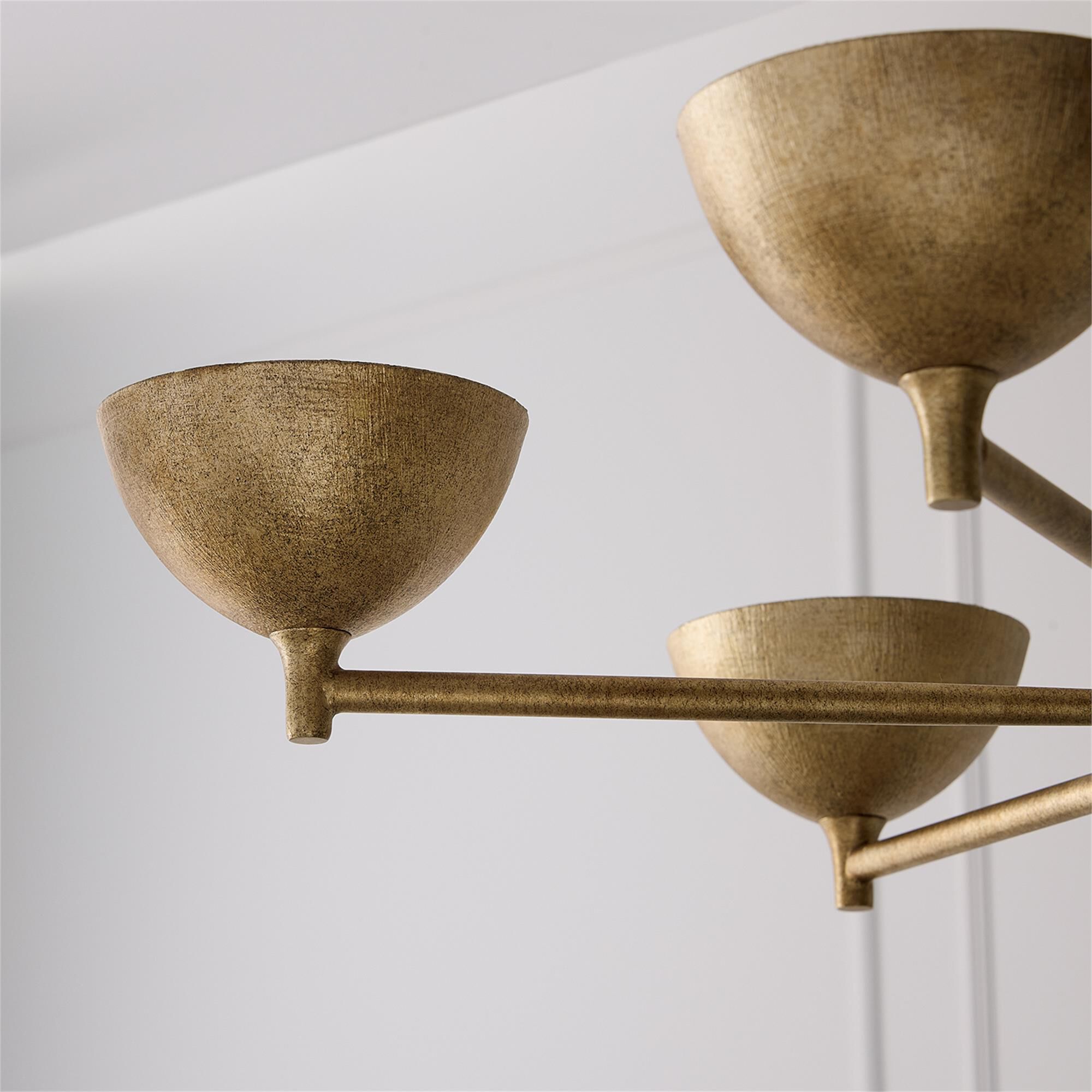 Shown in Feathered Gold finish and Textured Metal s shade