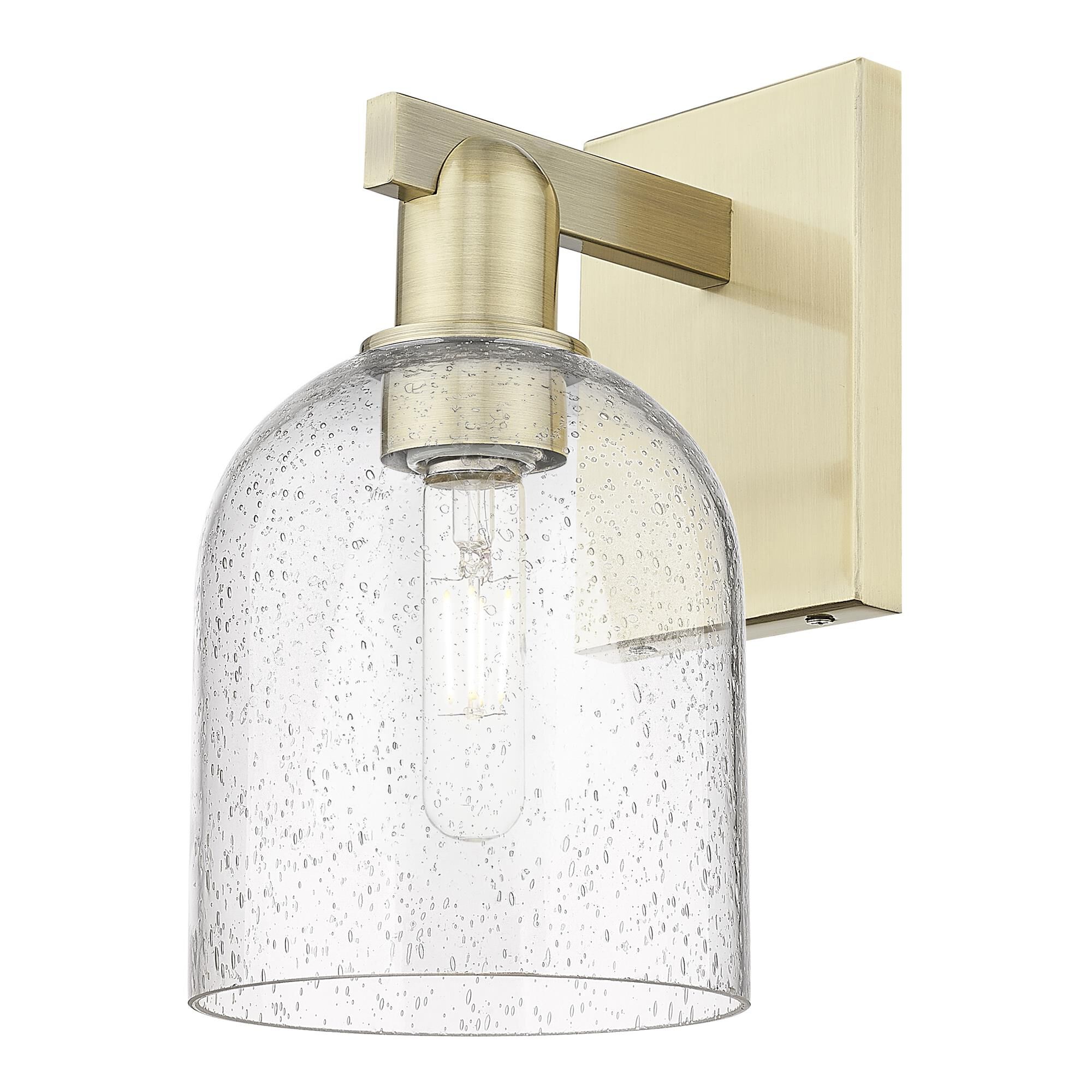 Shown in Antique Brass finish and Seedy glass