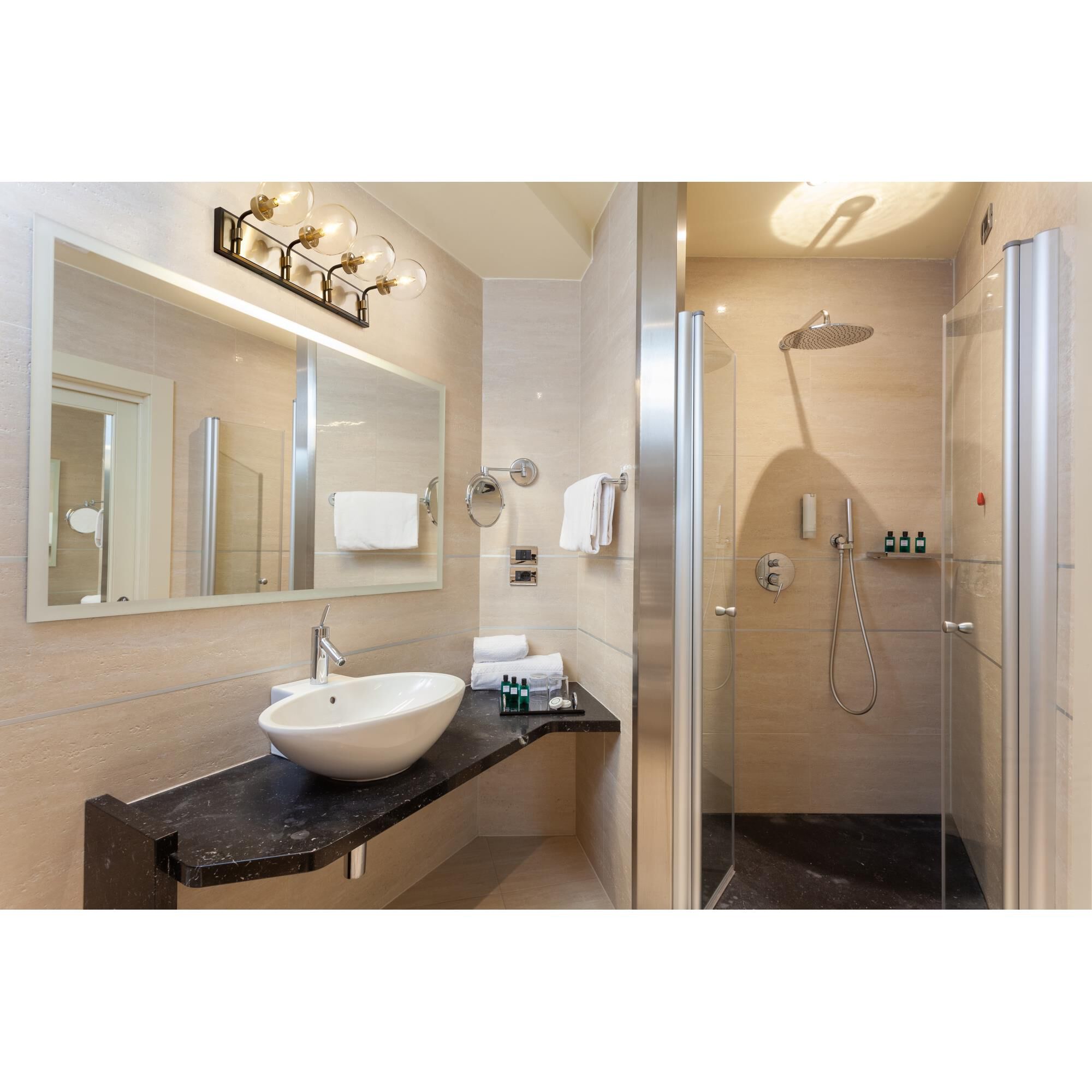 Shown in Matte Black + Brushed Nickel finish and Glass shade