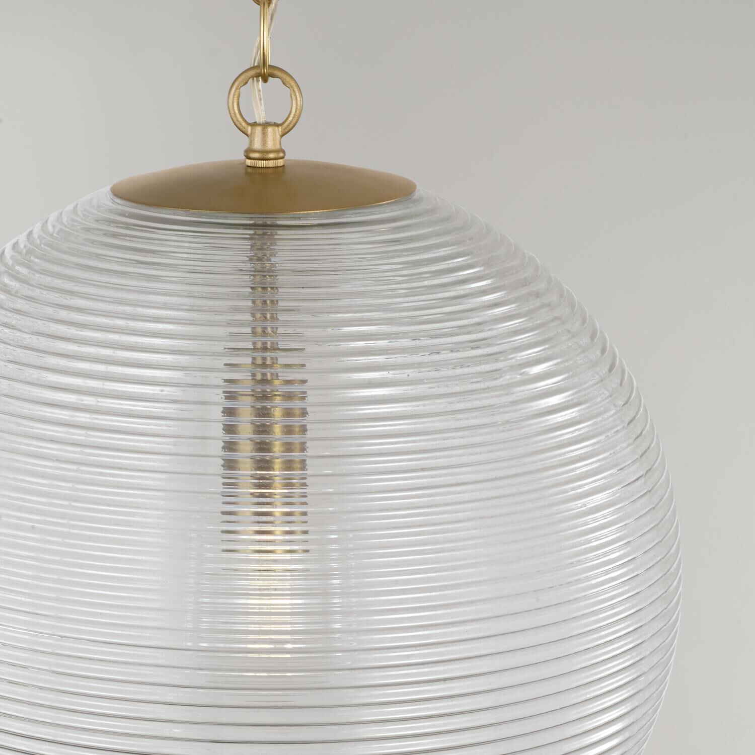Shown in Matte Brass finish and Clear Ribbed glass