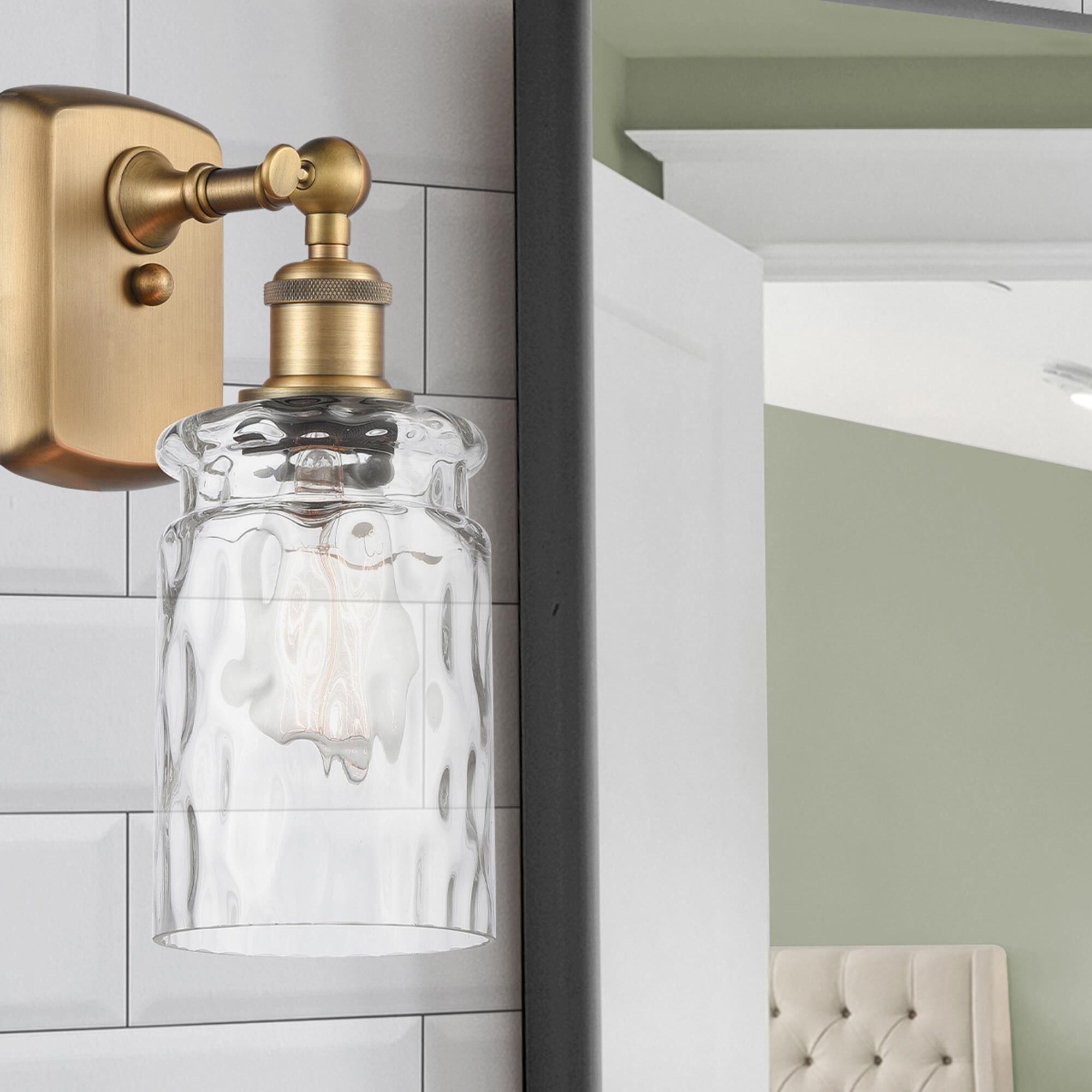 Shown in Brushed Brass finish and Clear WaterCandor glass and Polished Chrome accent