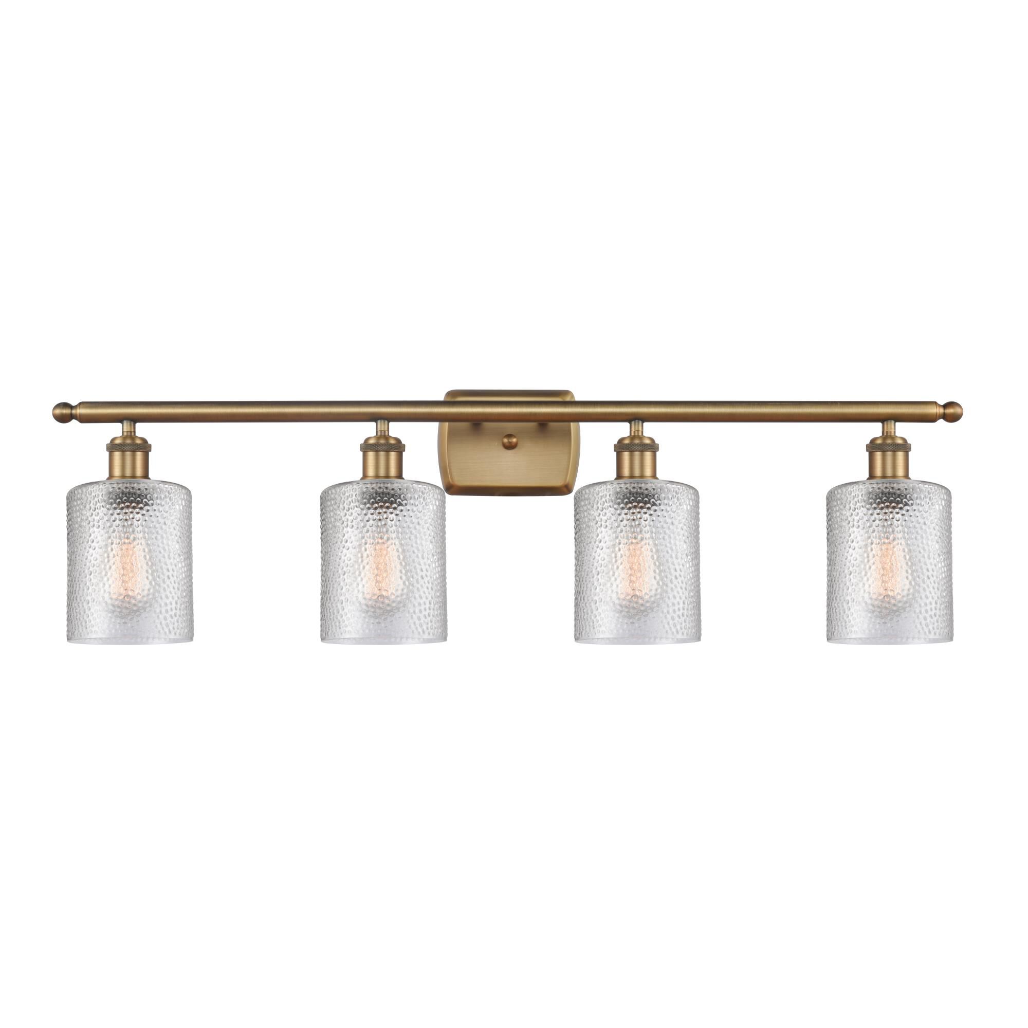 Shown in Brushed Brass finish and Drum glass and Glass shade