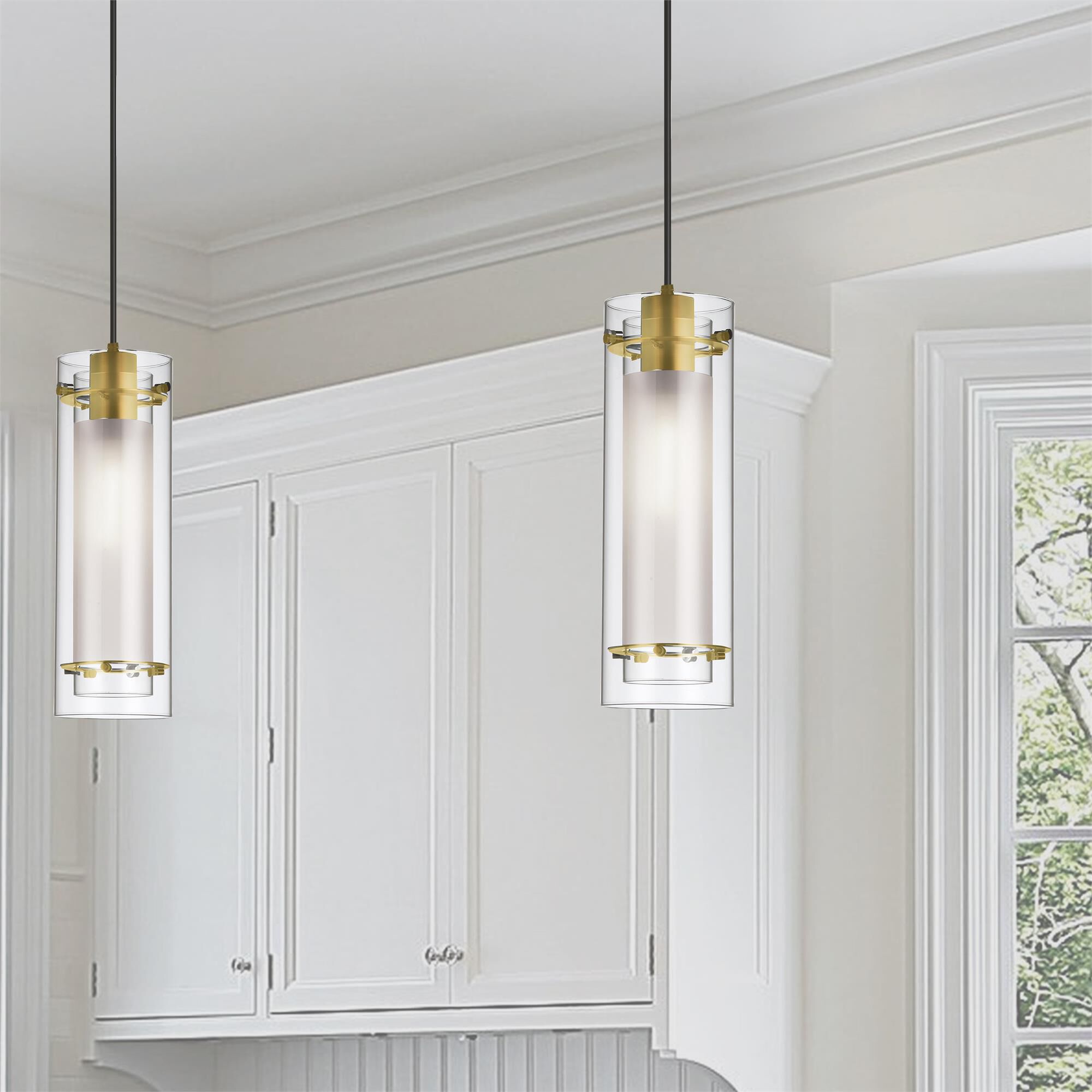 Shown in Aged Brass finish and Clear Cylinder glass