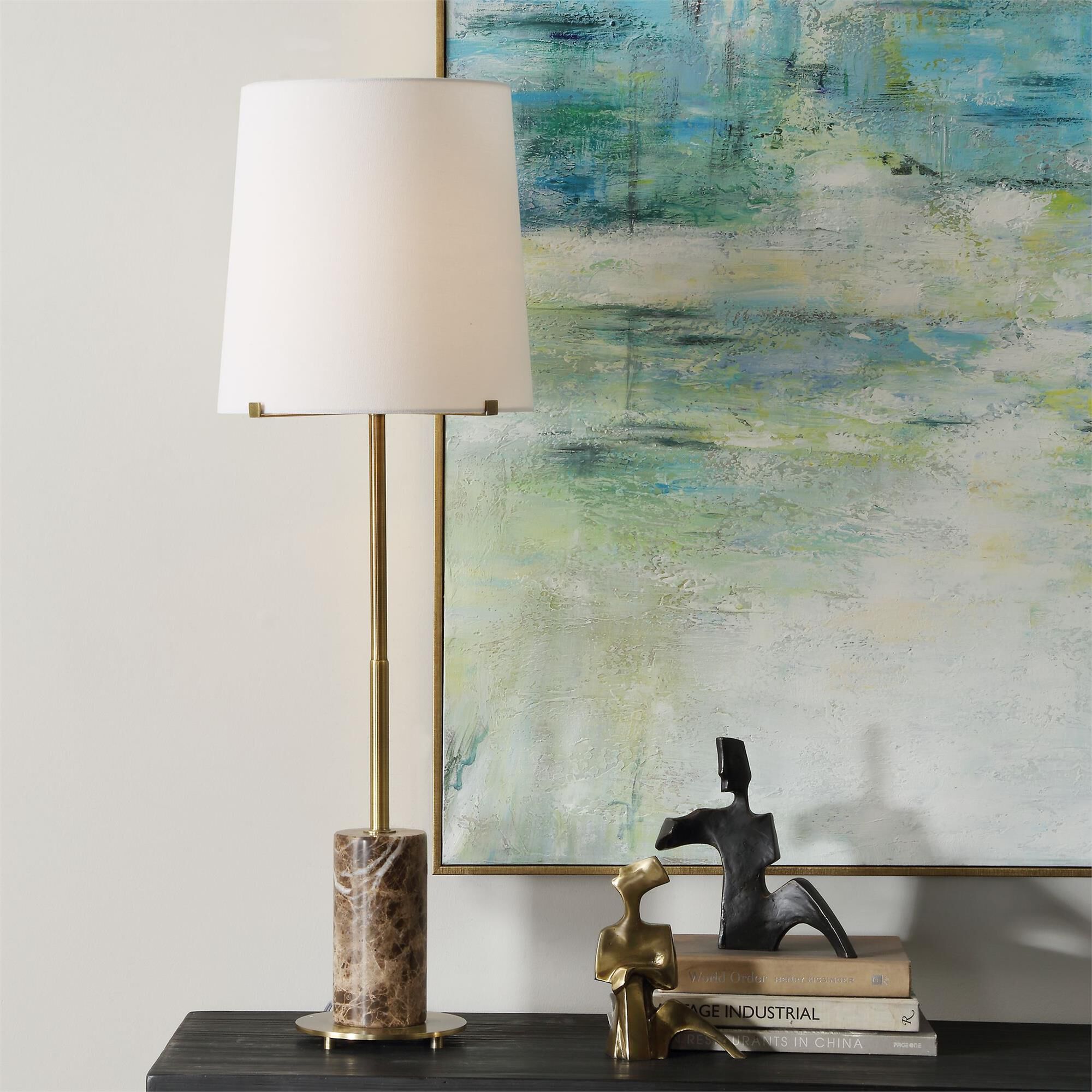 Shown in The Sepia Buffet Lamp Showcases A Brown Marble Cylinder Base Accented With Plated Antique Brass Deta finish and Round Hardback  Rolled Edge shade