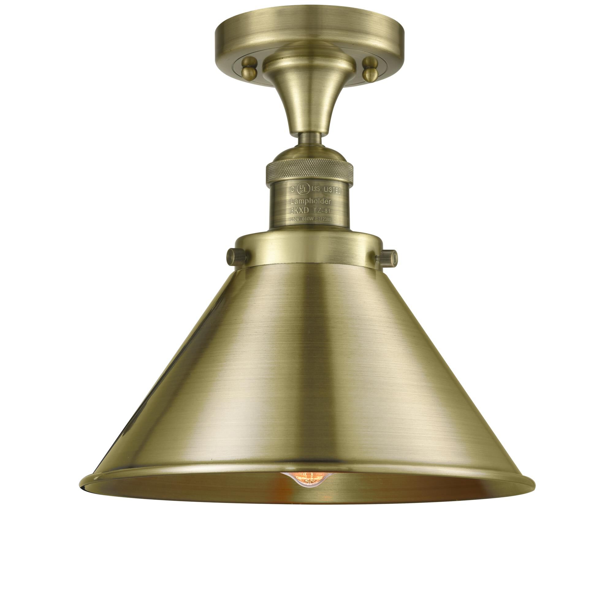 Shown in Antique Brass finish and Antique Brass shade