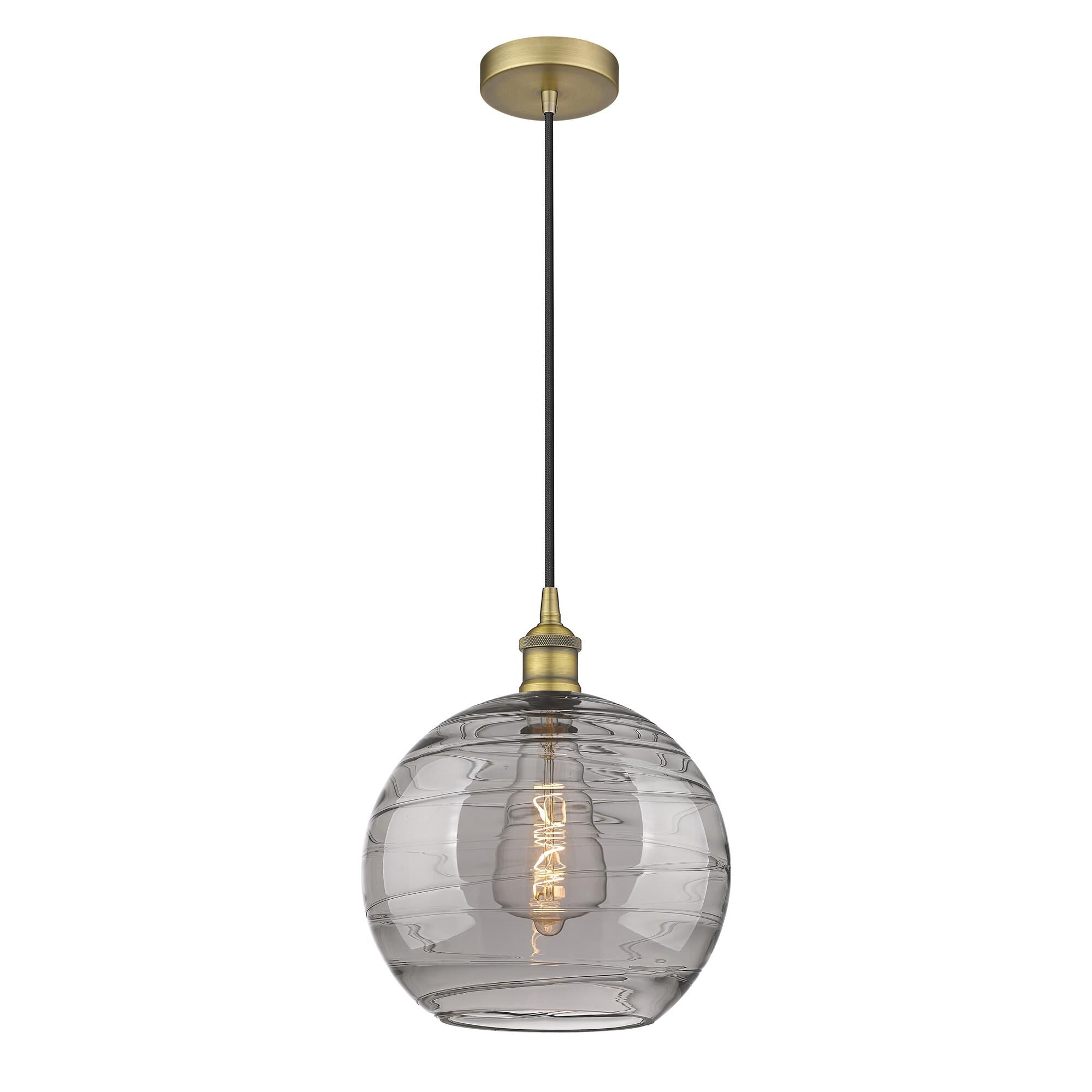 Shown in Brushed Brass finish and Light Smoke Deco Swirl glass