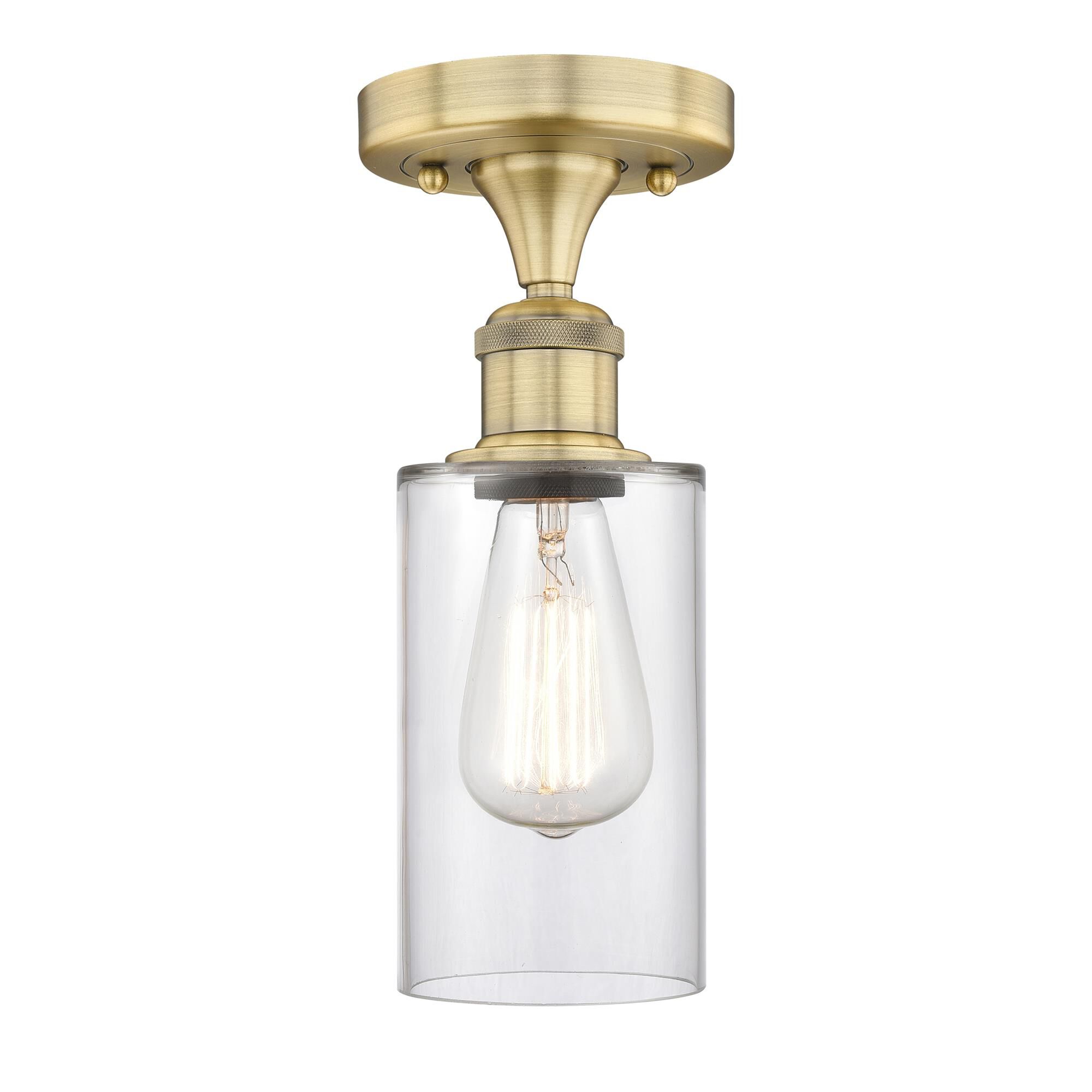 Shown in Brushed Brass finish and Clear glass