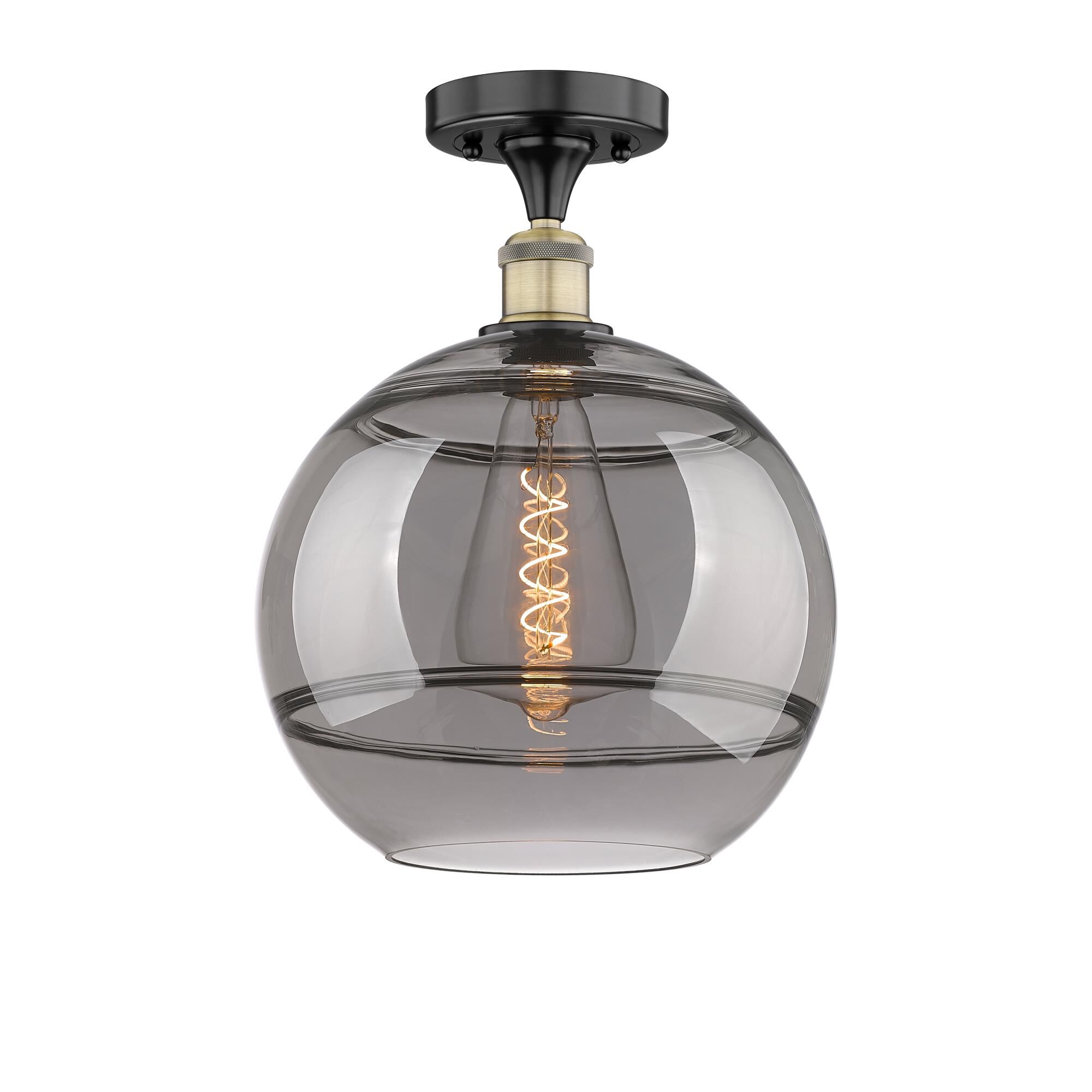 Shown in Black Antique Brass finish and Light Smoke glass