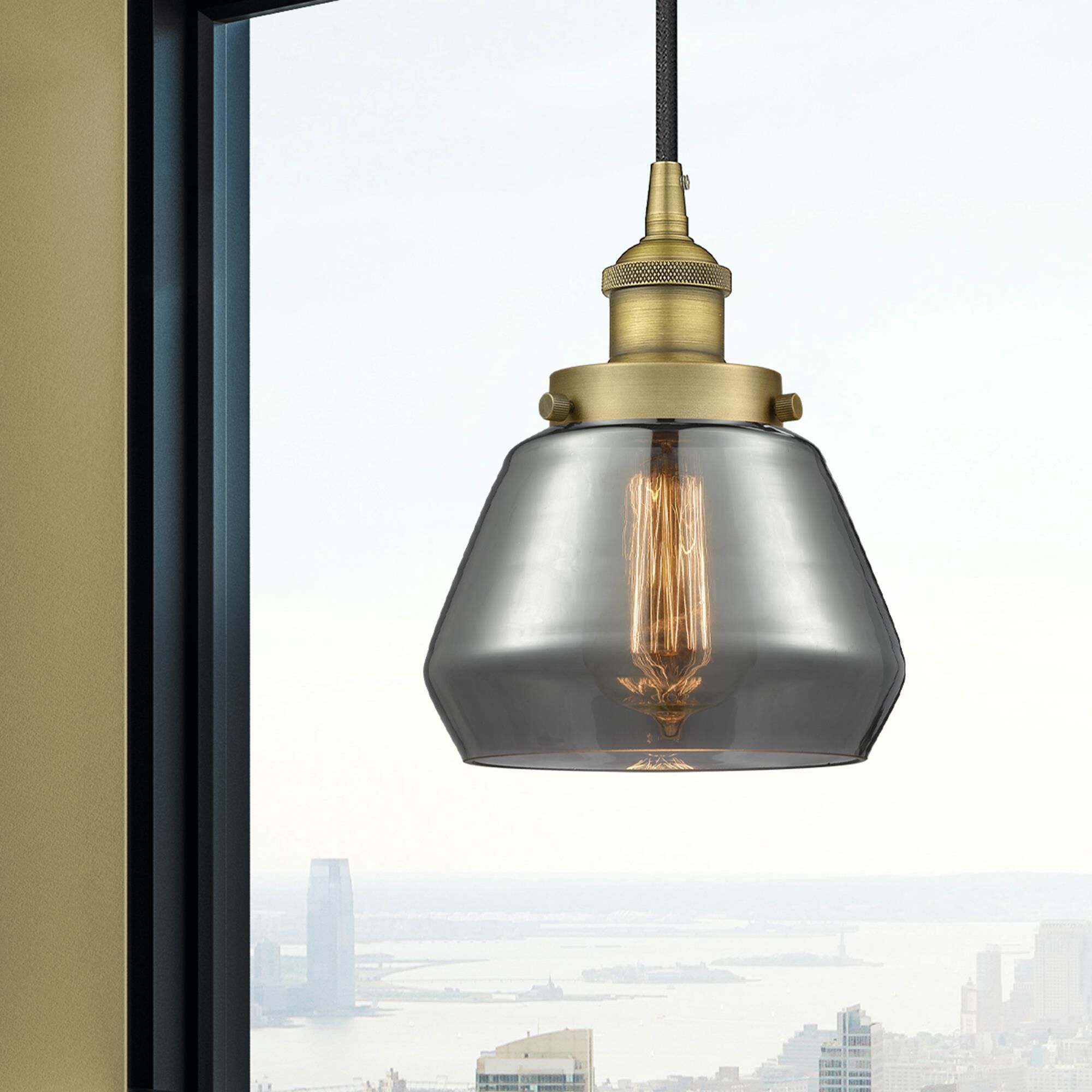 Shown in Brushed Brass finish and Plated Smoke glass