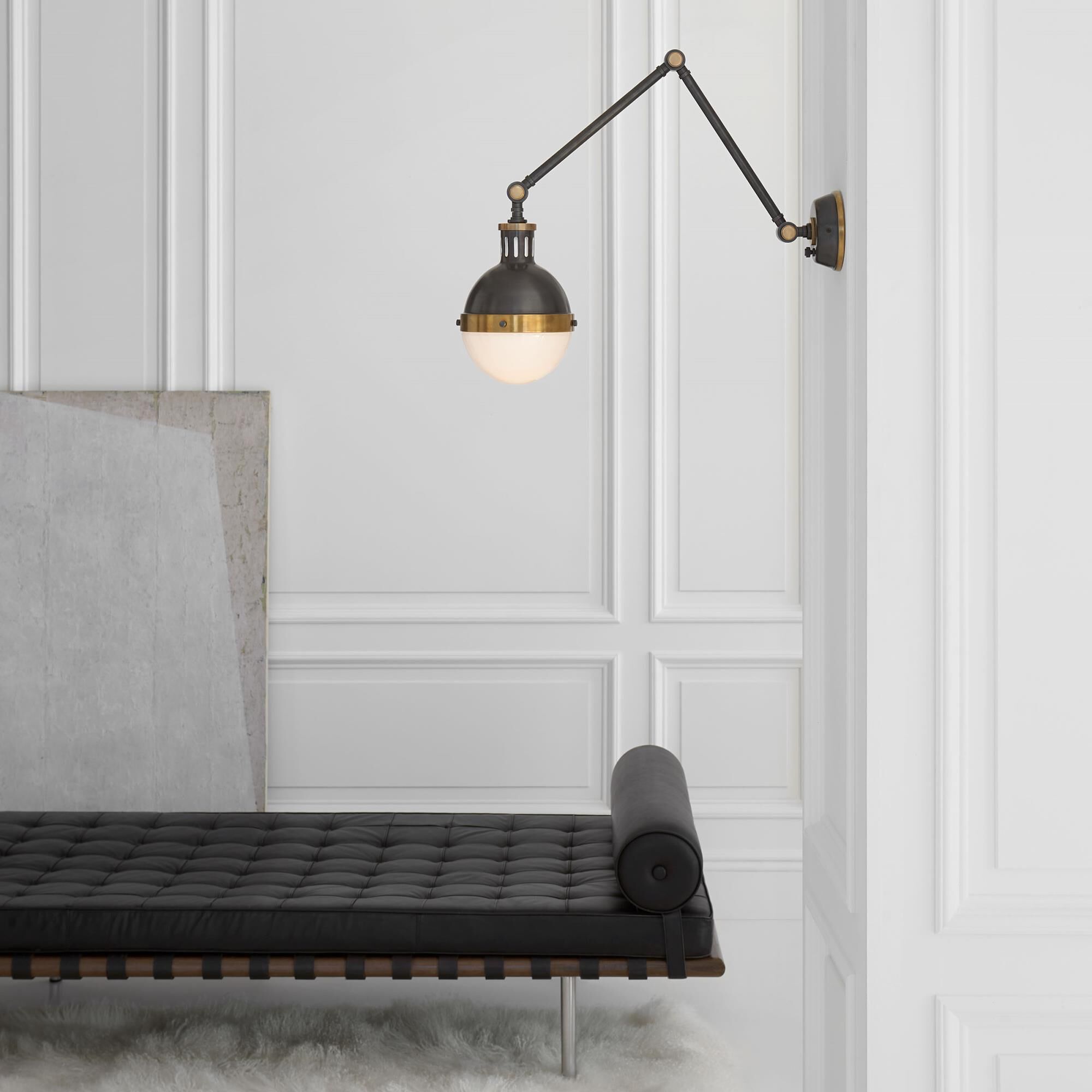 Shown in Bronze With Antique Brass finish and White glass