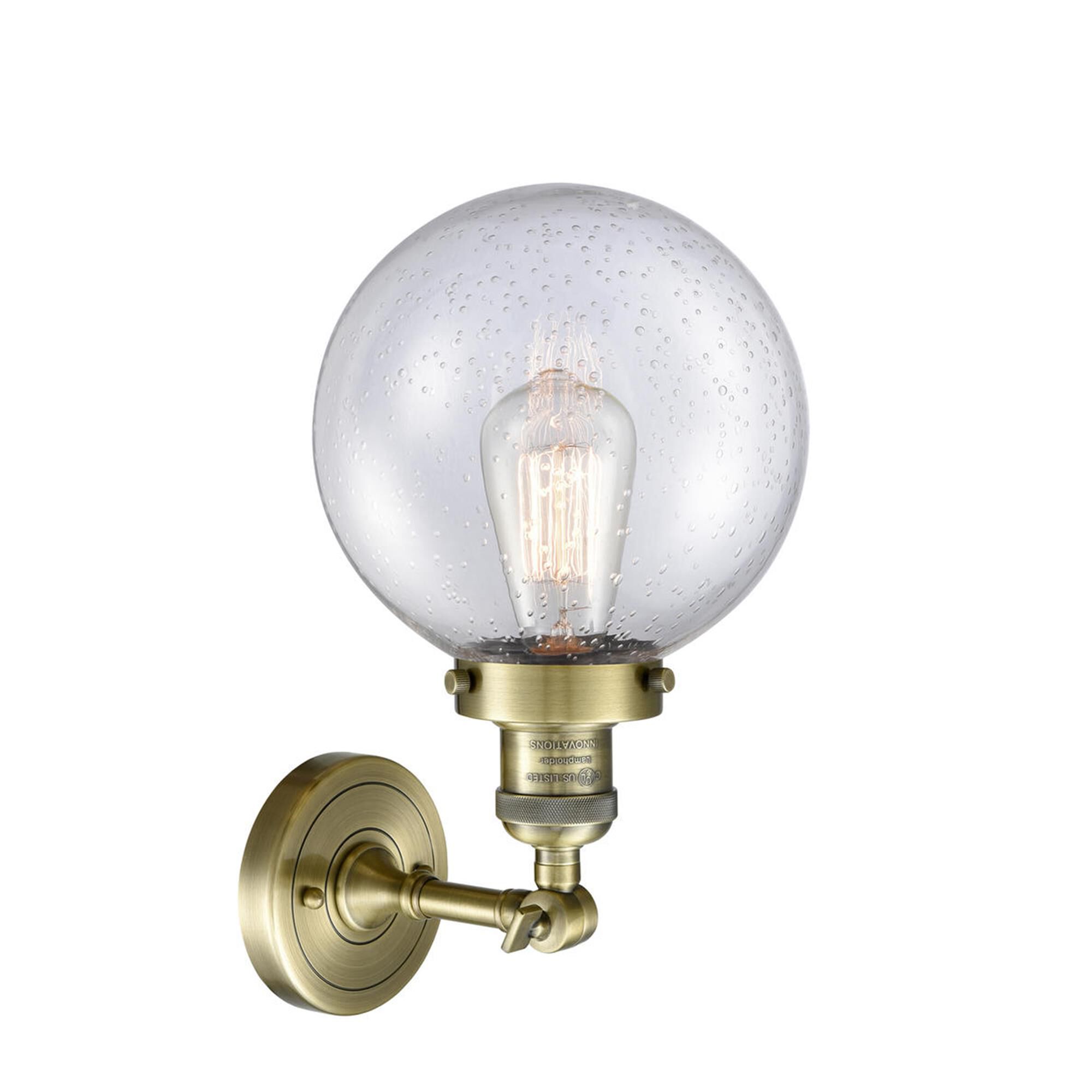 Shown in Antique Brass finish and Seedy glass and No Accent accent