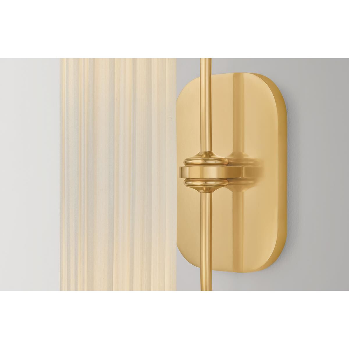 Shown in Aged Brass finish and Ivory Silk shade