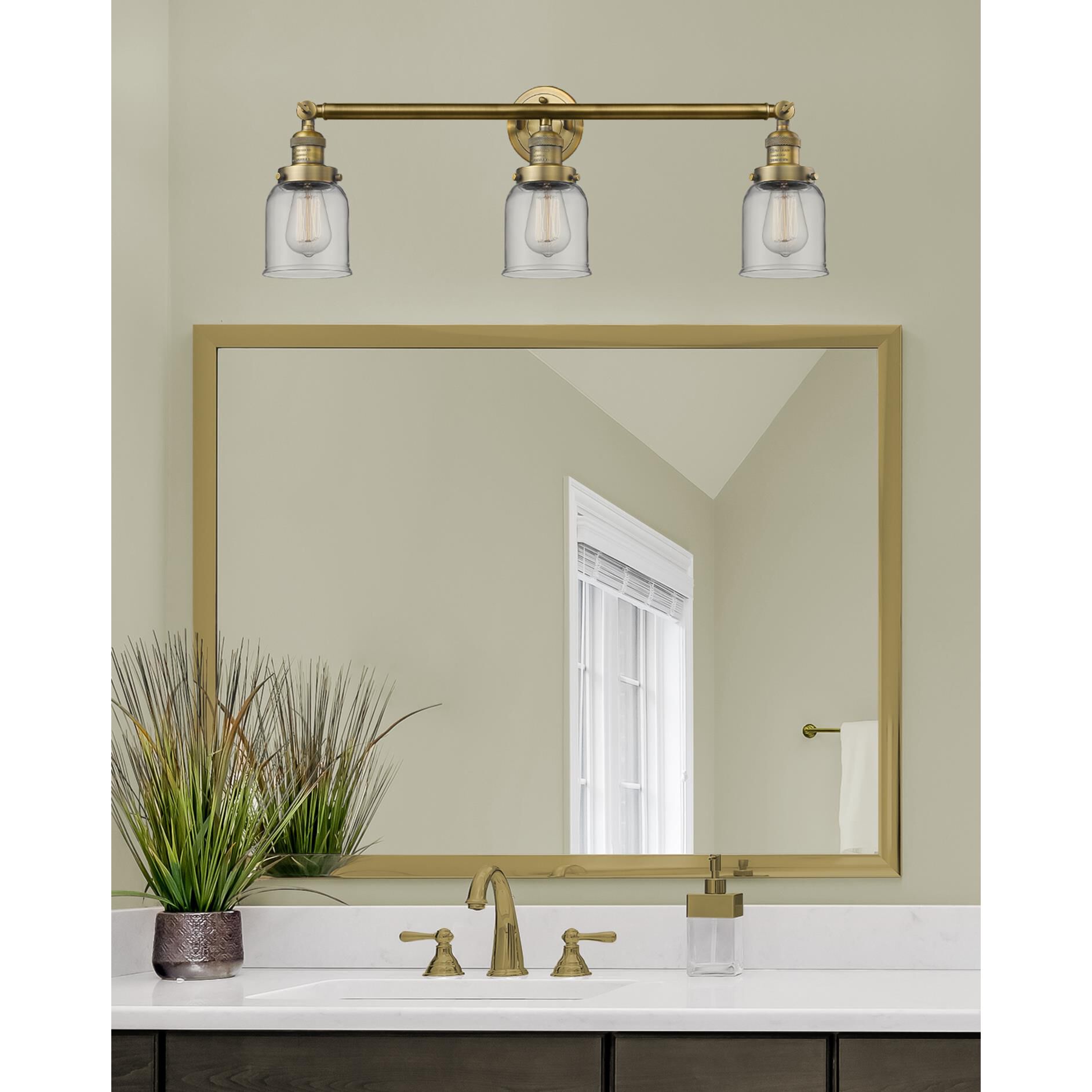 Shown in Brushed Brass finish and Clear glass
