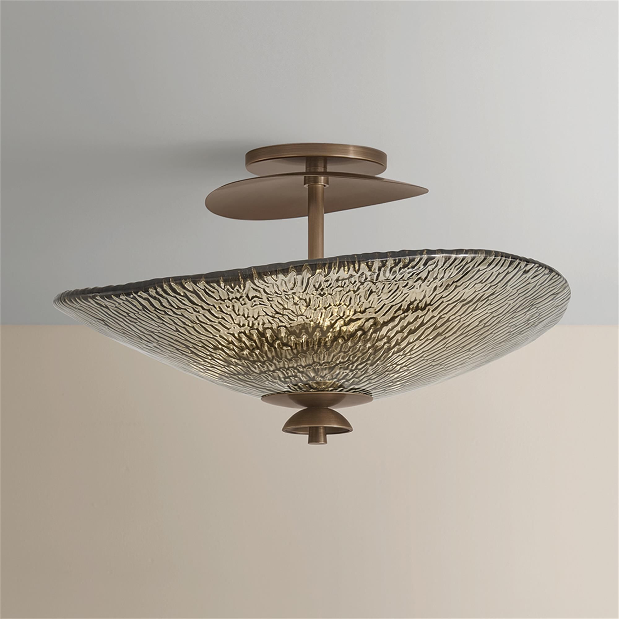 Shown in Old World Brass finish and Bronze glass