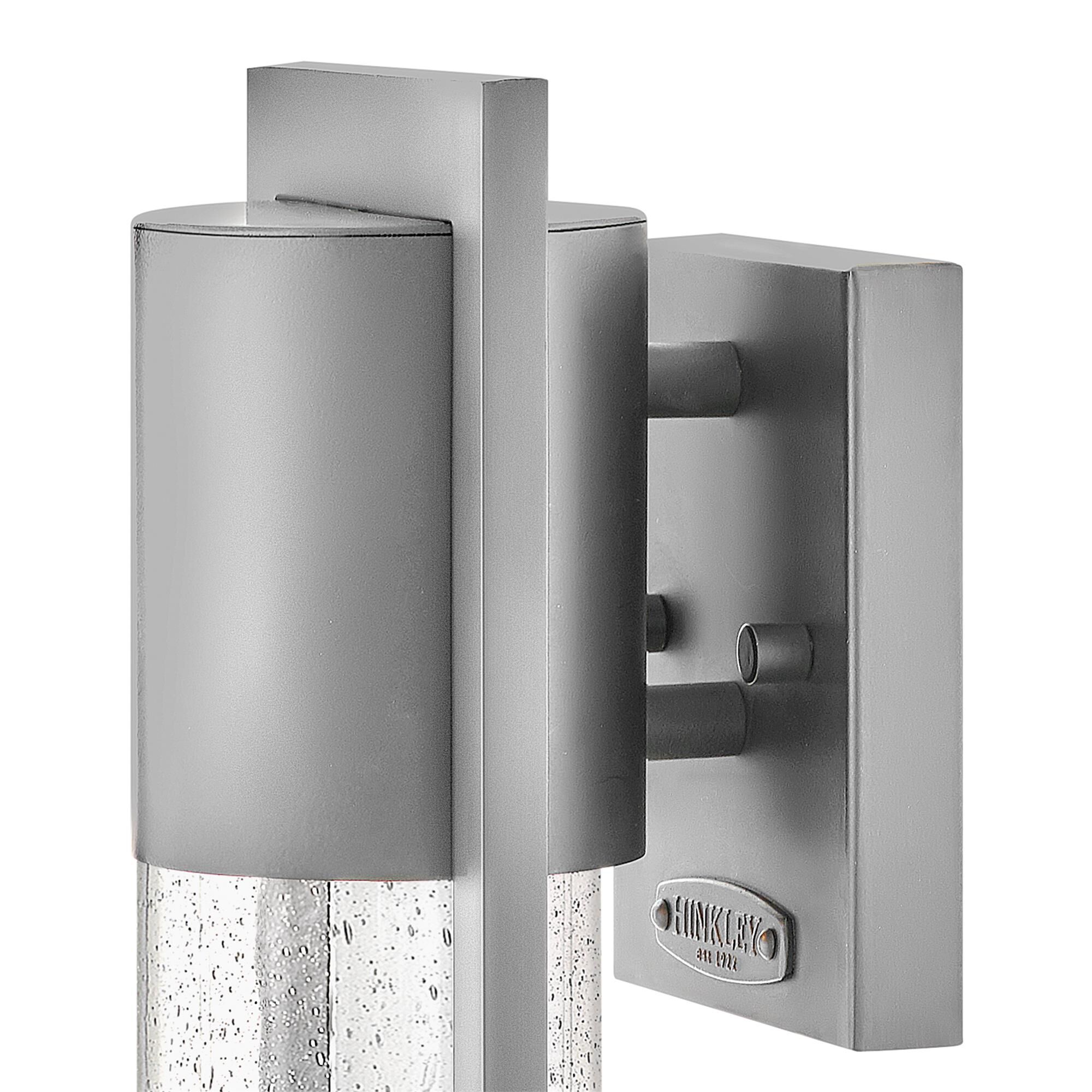 Shown in Hematite finish and Clear Seedy glass