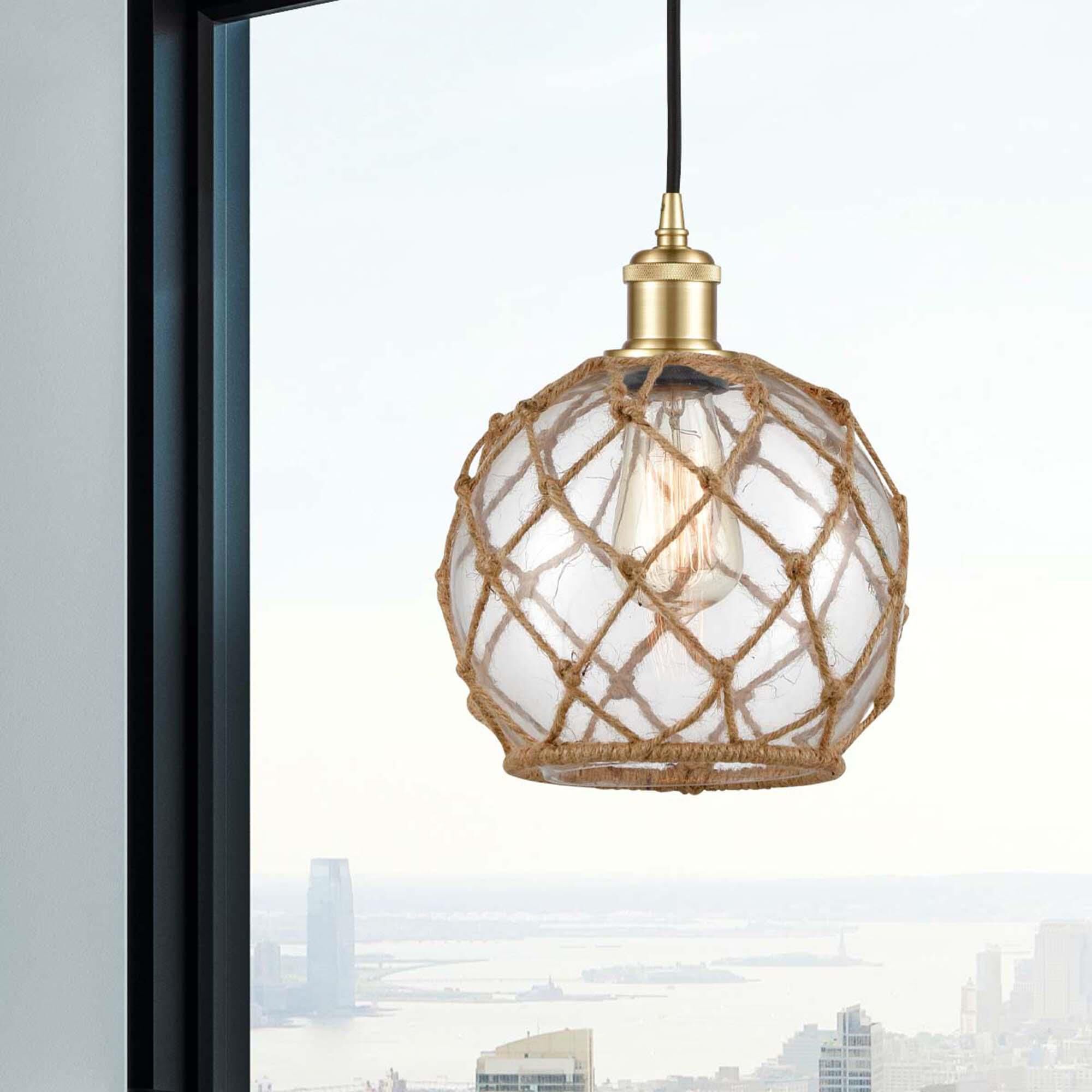 Shown in Satin Gold finish and Clear Farmhousewith Brown Rope glass and Polished Chrome accent