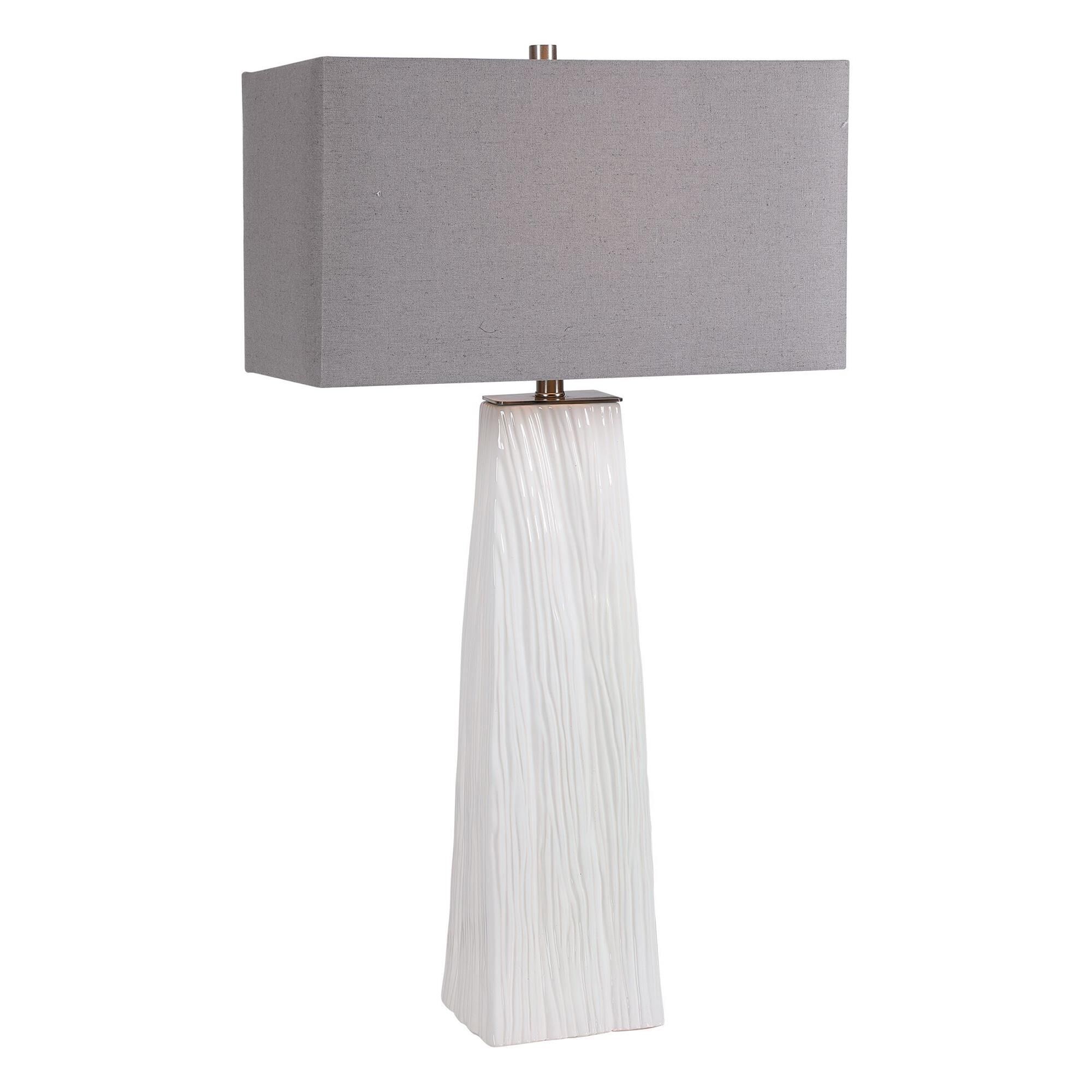 Shown in Elegant And Versatile, This Table Lamp Features A Gloss White Ceramic Base Featuring Organic Hand Ca finish and Rectangle Hardback shade