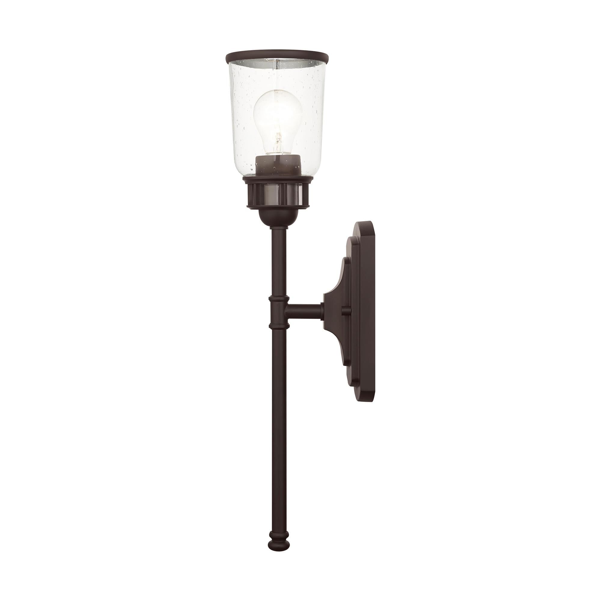 Shown in Bronze finish and Hand Blown Clear Seeded glass and Hand Blown Clear Seeded Glass shade
