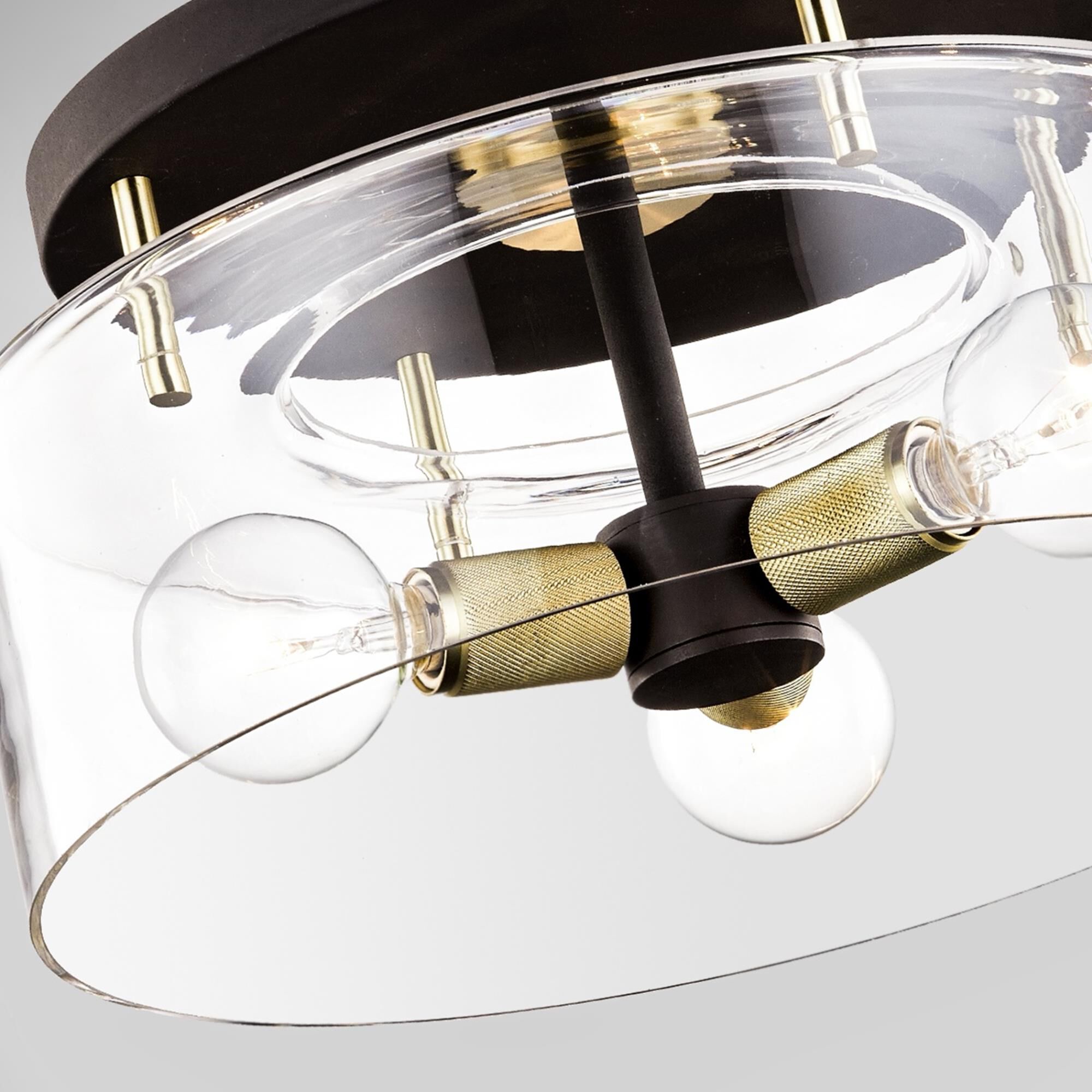 Shown in Bronze And Brass finish and Clear glass and Glass shade