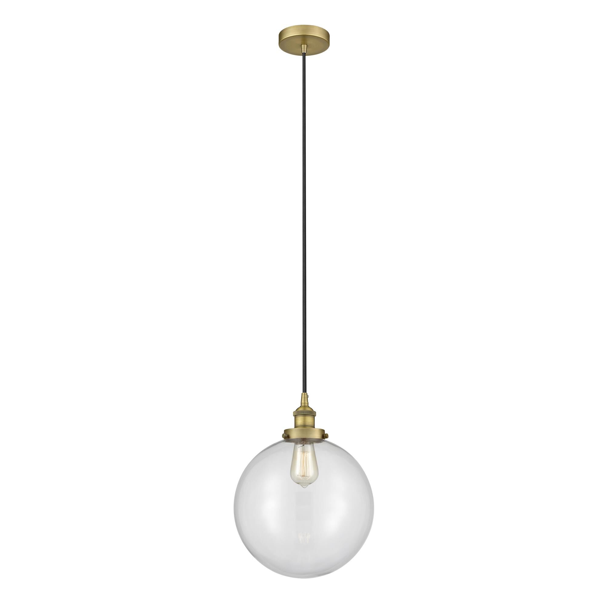 Shown in Brushed Brass finish and Clear Beacon glass