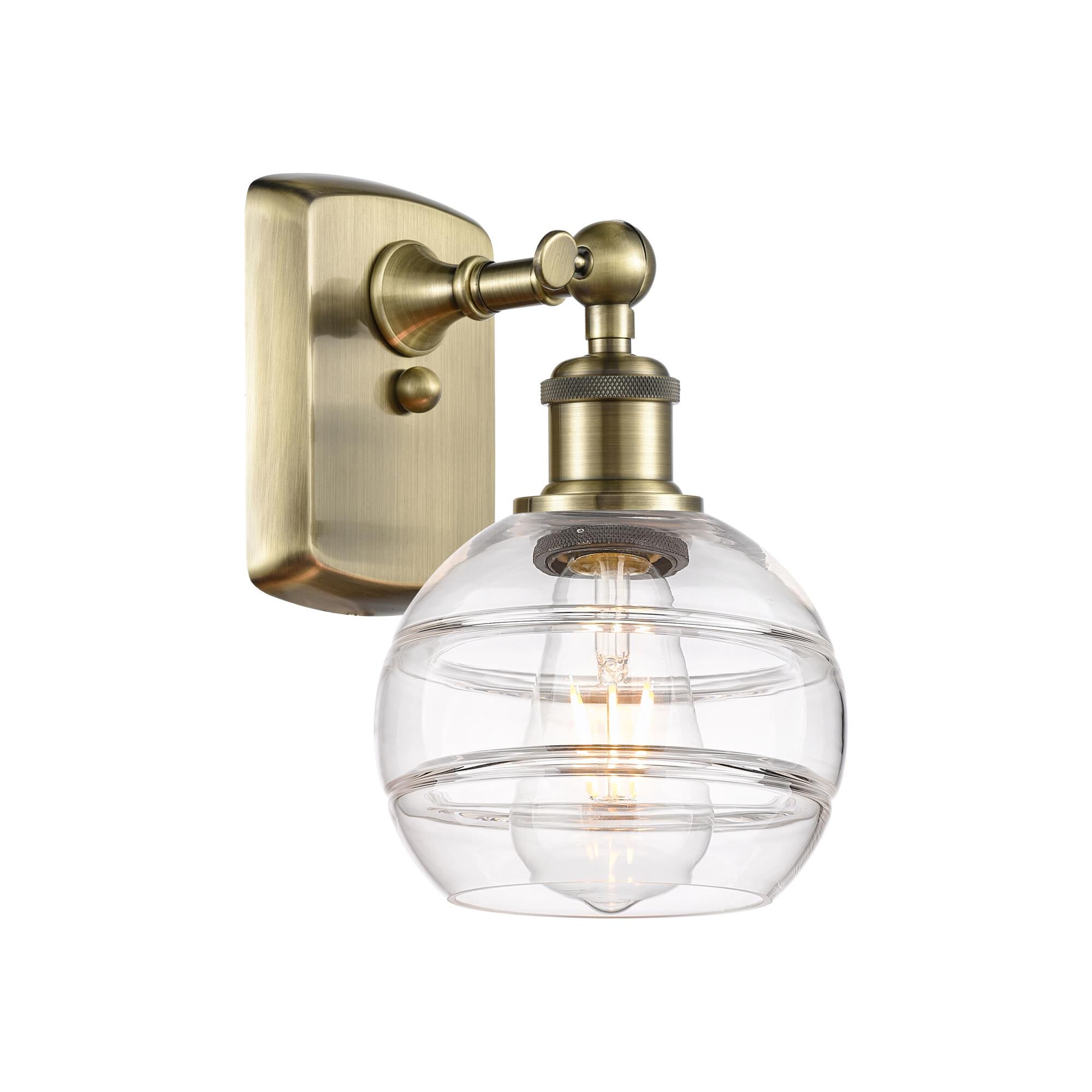 Shown in Antique Brass finish and Clear glass