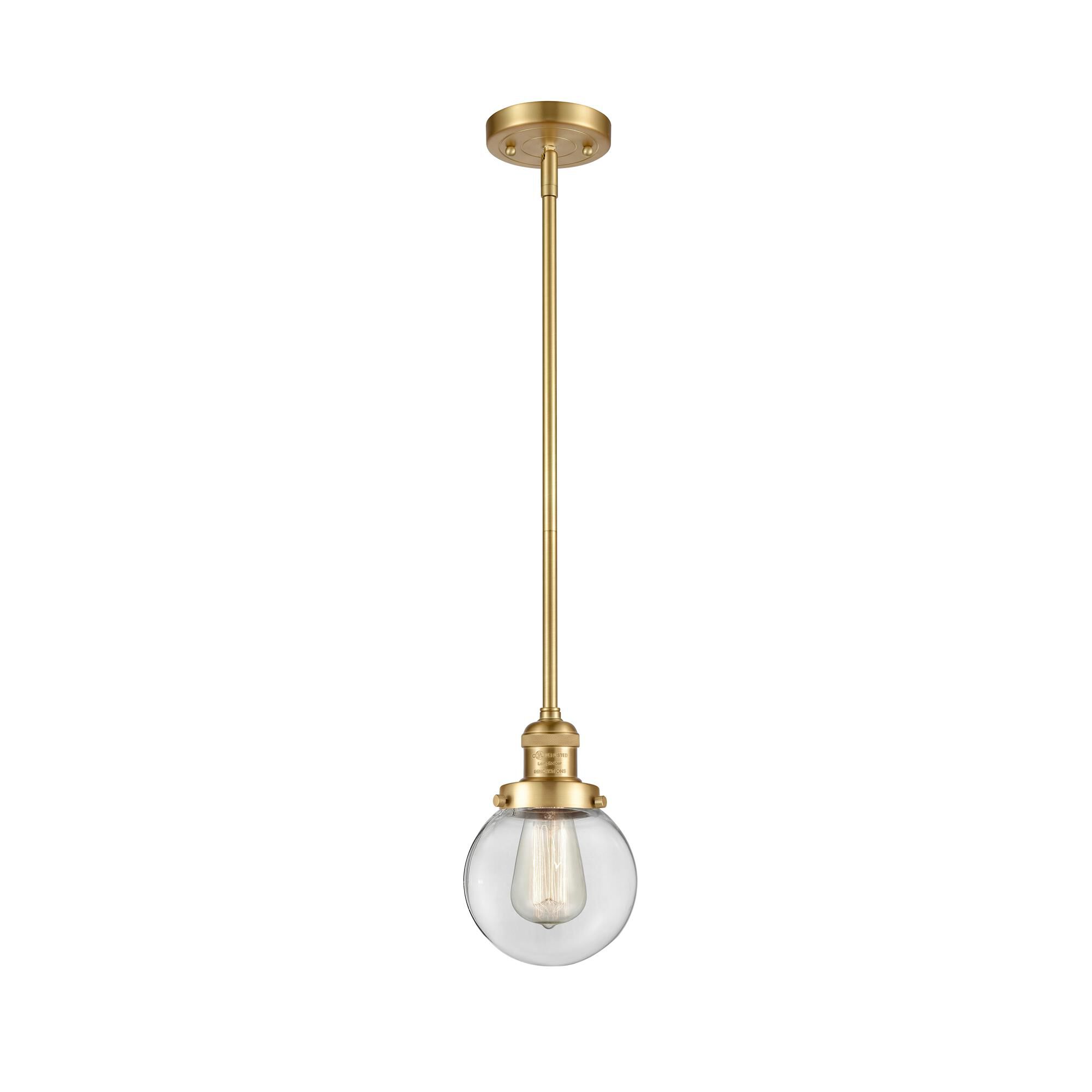 Shown in Satin Gold finish and Clear Beacon glass