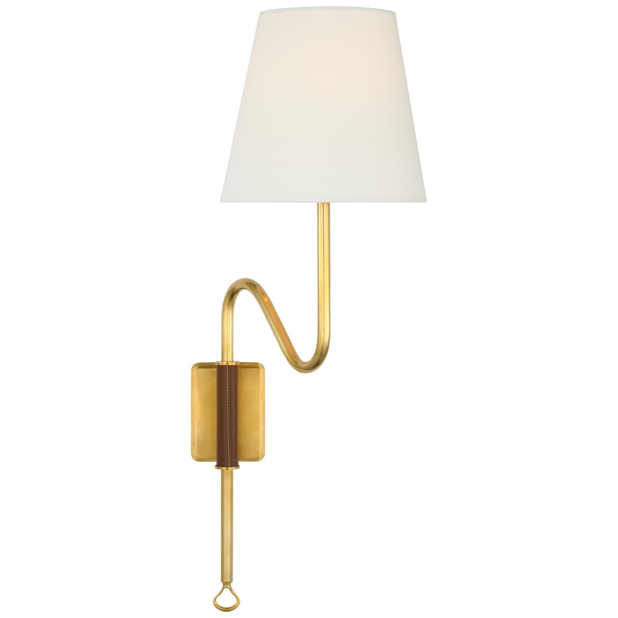 Shown in Hand-Rubbed Antique Brass and Saddle Leather finish and Linen shade
