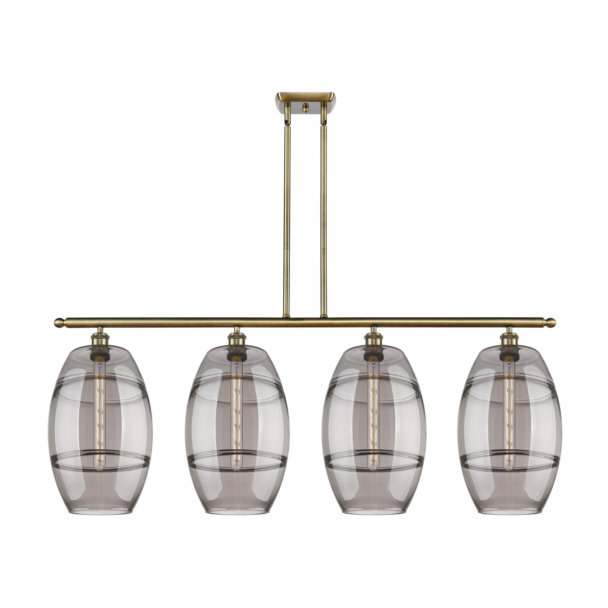 Shown in Antique Brass finish and Light Smoke glass