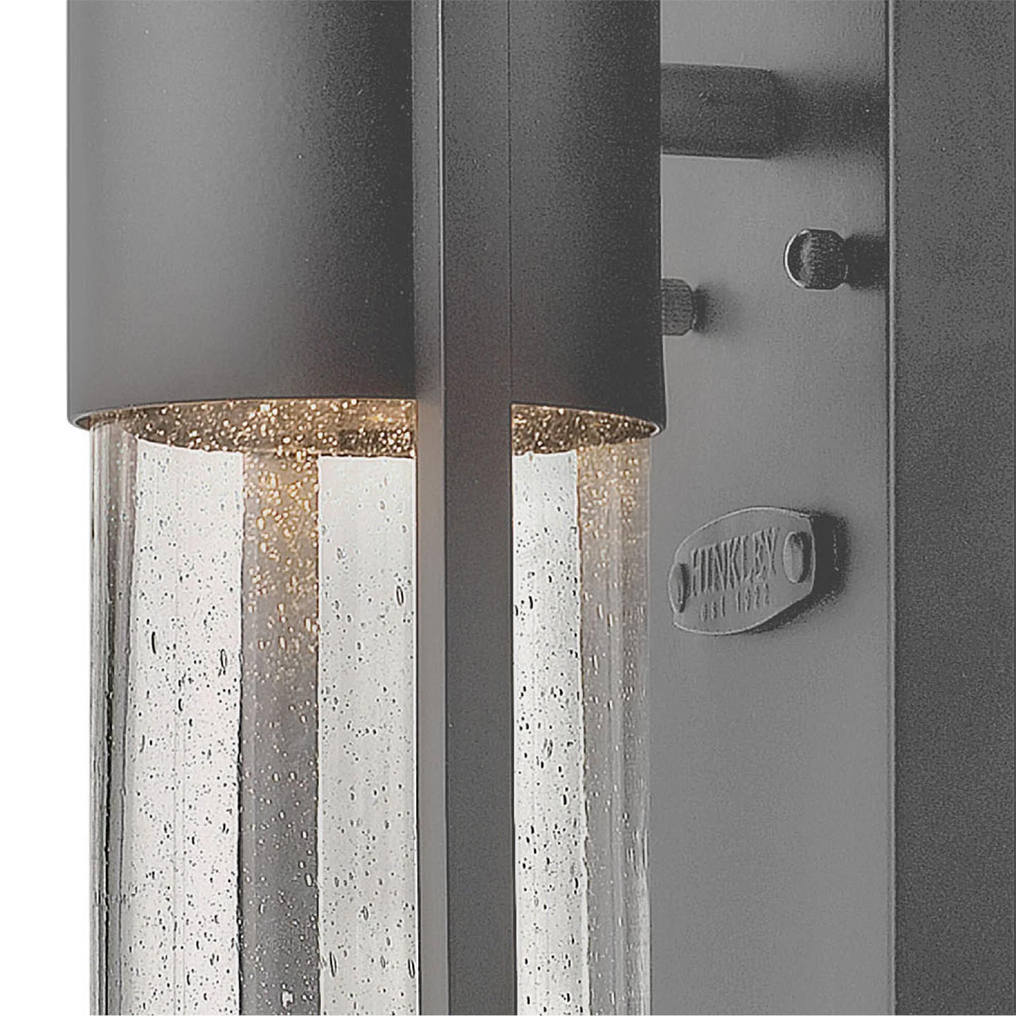 Shown in Hematite finish and Clear Seedy glass