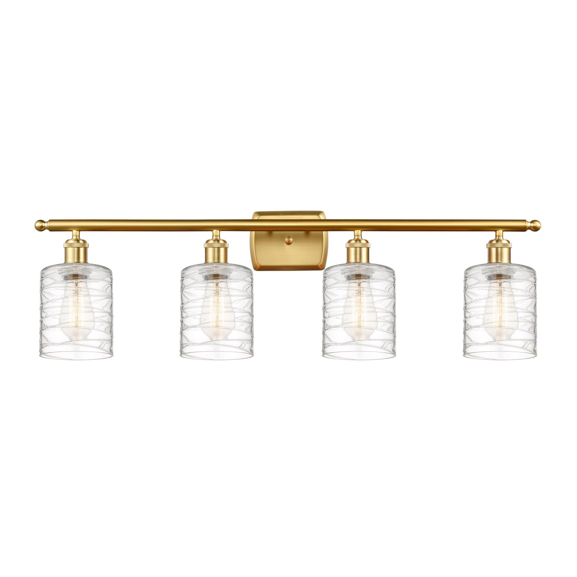 Shown in Satin Gold finish and Deco Swirl Cobbleskill glass