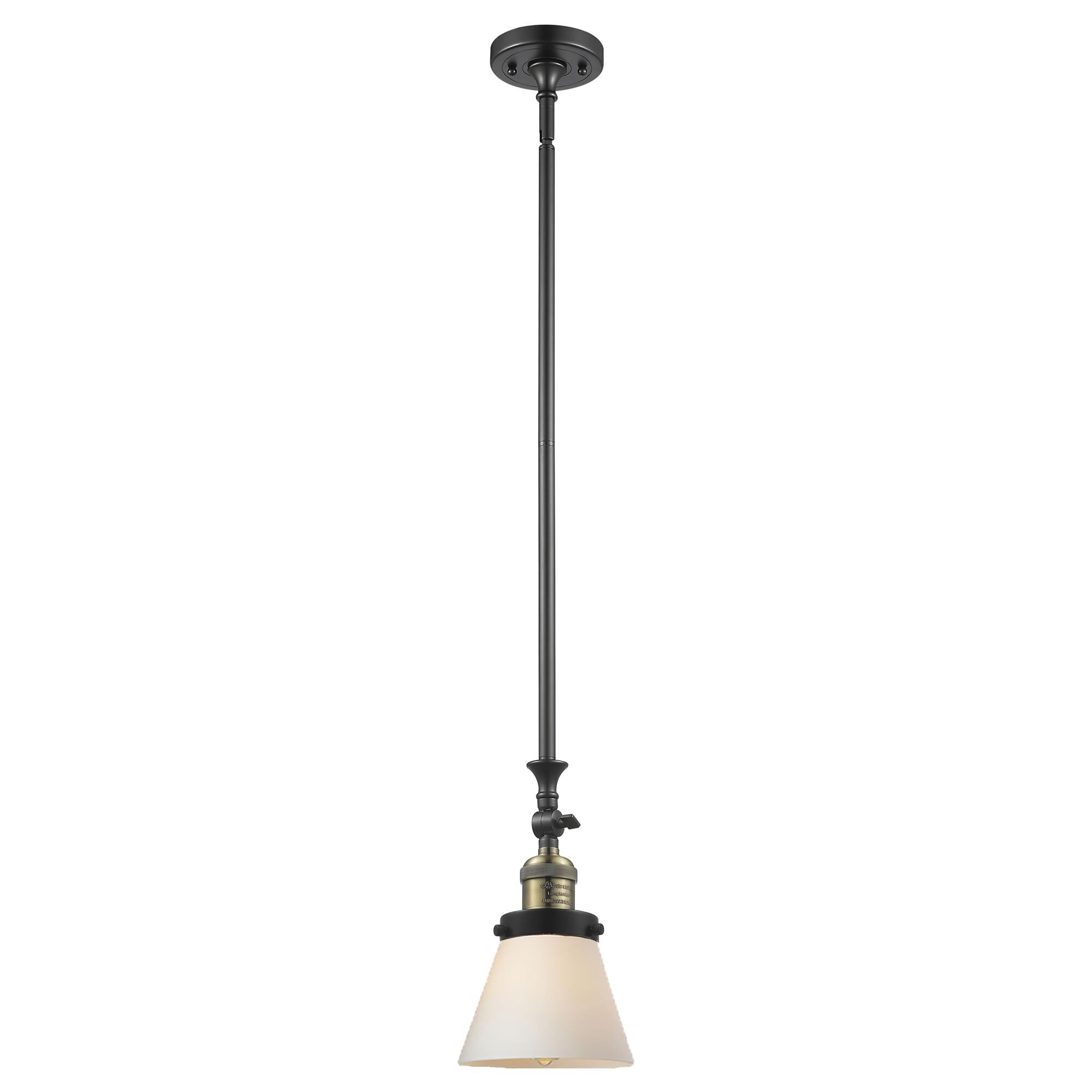 Shown in Black Antique Brass finish and Matte White Cased glass