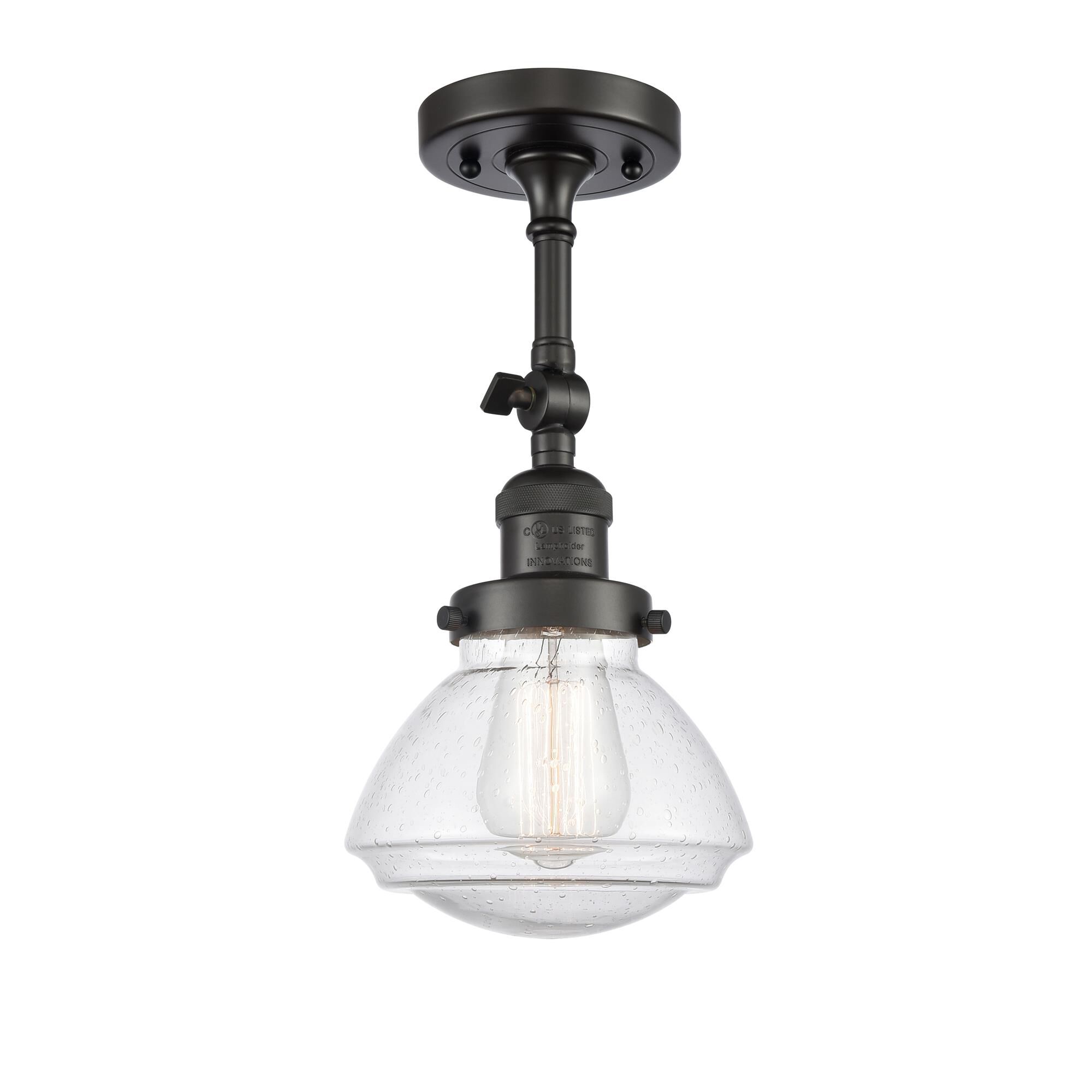Shown in Oil Rubbed Bronze finish and Seeded Seedy Olean glass and Glass shade and Bulb Tint - Amber accent